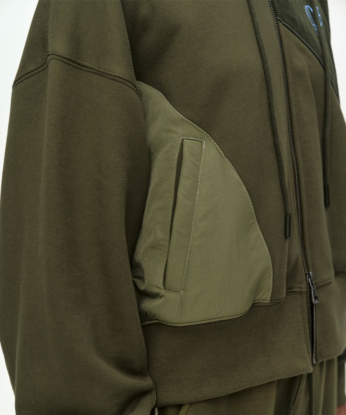 앤더슨벨(ADSB ANDERSSON BELL) PATCHWORK MA-1 HOODIE ZIP UP atb1507w(KHAKI)