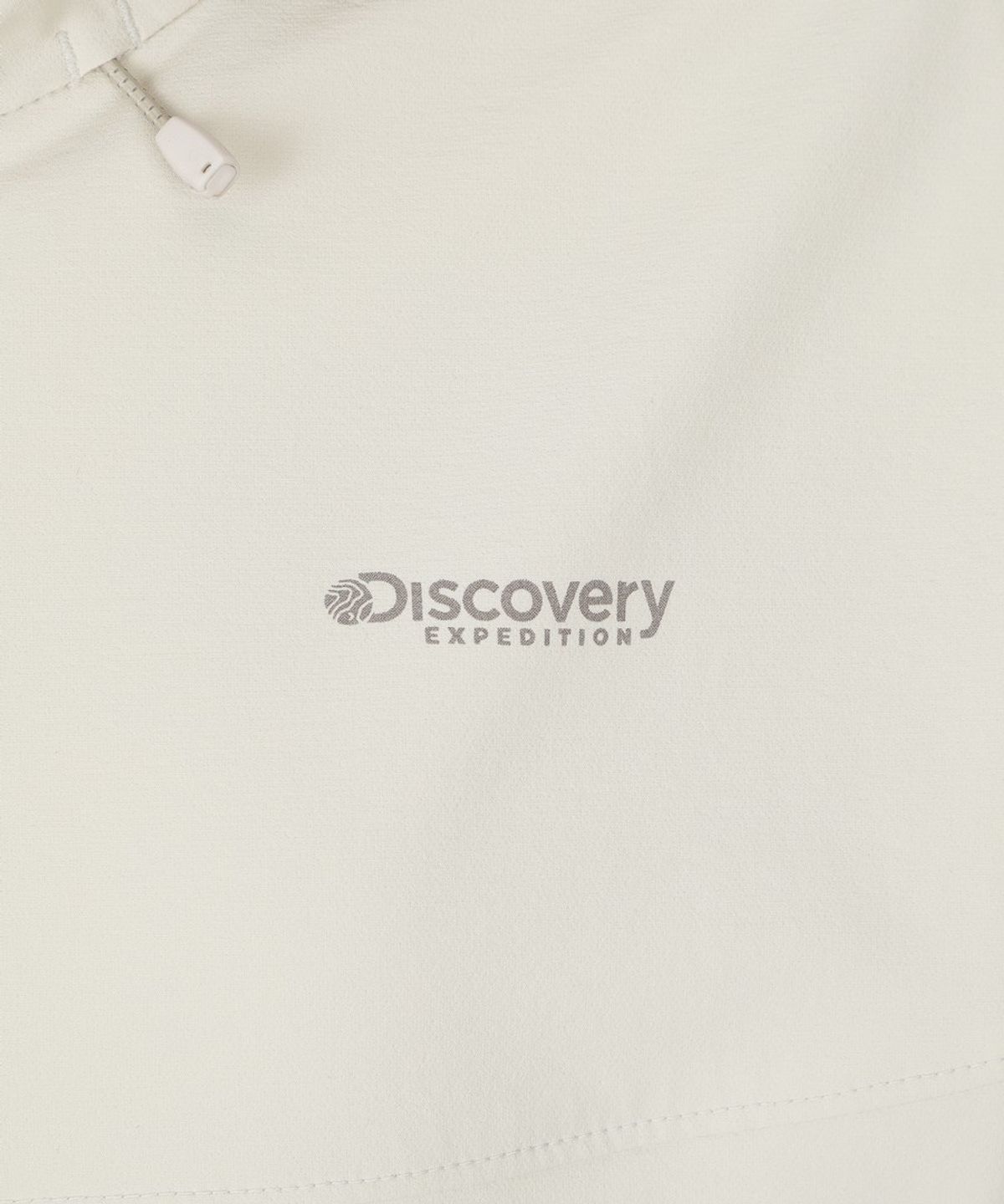 디스커버리 익스페디션(DISCOVERY EXPEDITION) 여성 스트레치 우븐 트레이닝 크롭 후드 아노락 (D/IVORY)