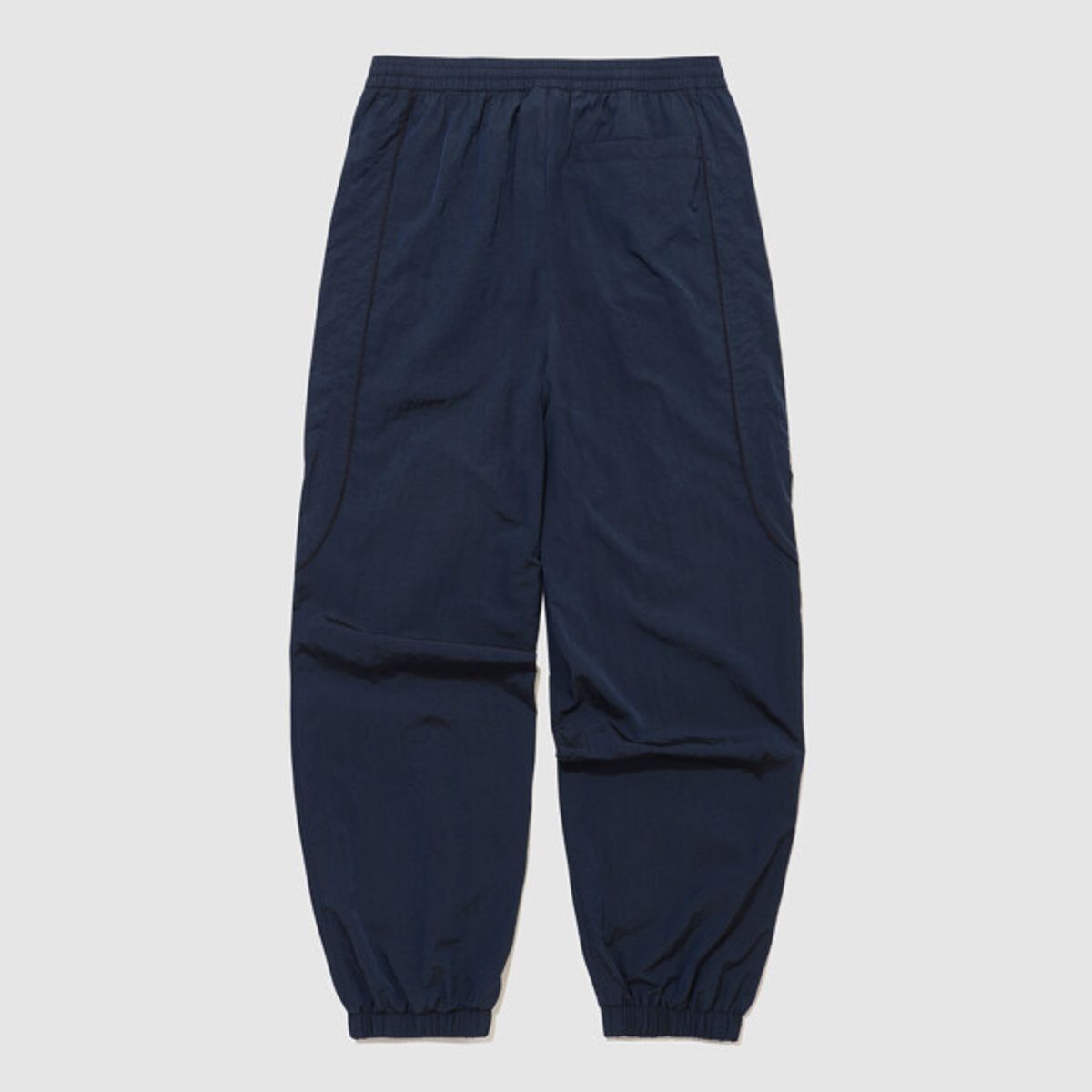 엄브로(UMBRO) HBL OG 우븐 조거 팬츠 네이비 UR121CPT23
