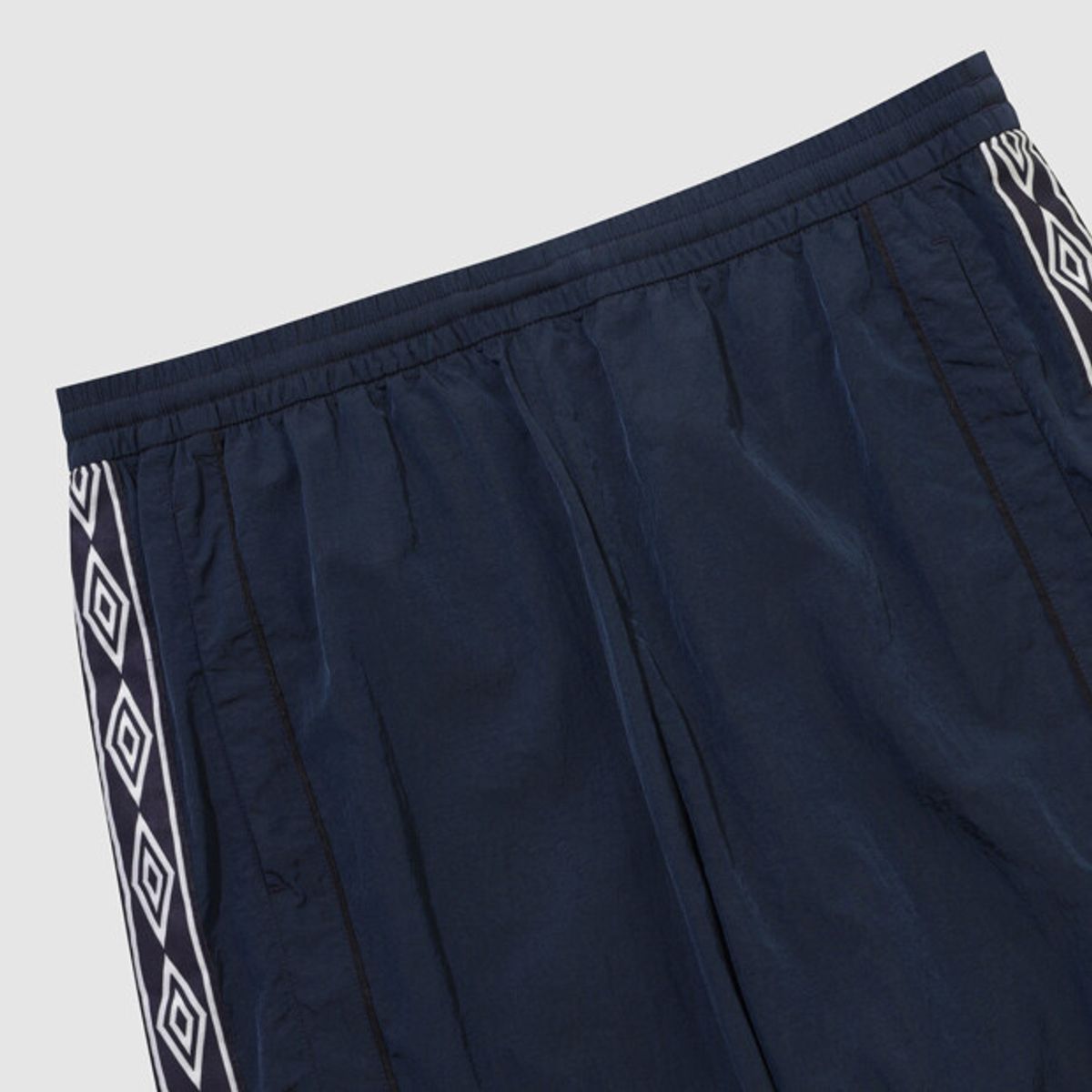 엄브로(UMBRO) HBL OG 우븐 조거 팬츠 네이비 UR121CPT23