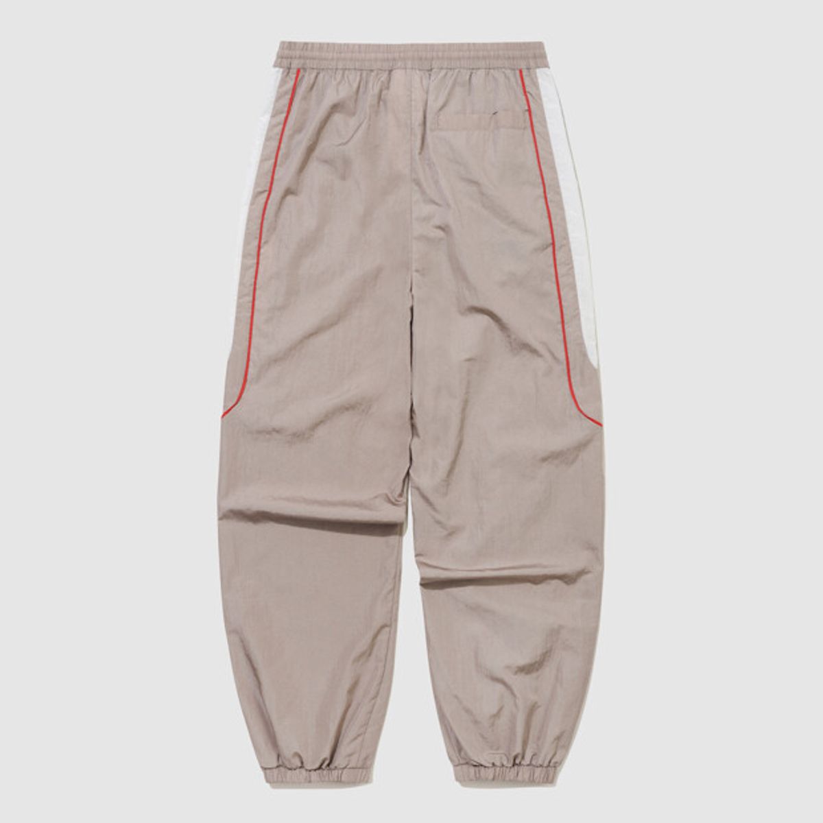 엄브로(UMBRO) HBL OG 우븐 조거 팬츠 베이지 UR121CPT23