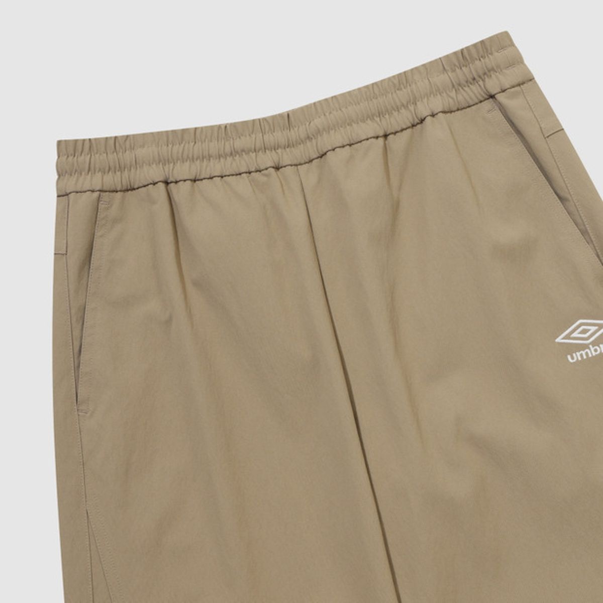 엄브로(UMBRO) 캐주얼 스판 테이퍼드 팬츠 베이지 UR123CPT13