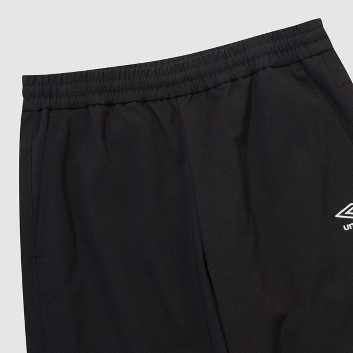 엄브로(UMBRO) 캐주얼 스판 테이퍼드 팬츠 블랙 UR123CPT13
