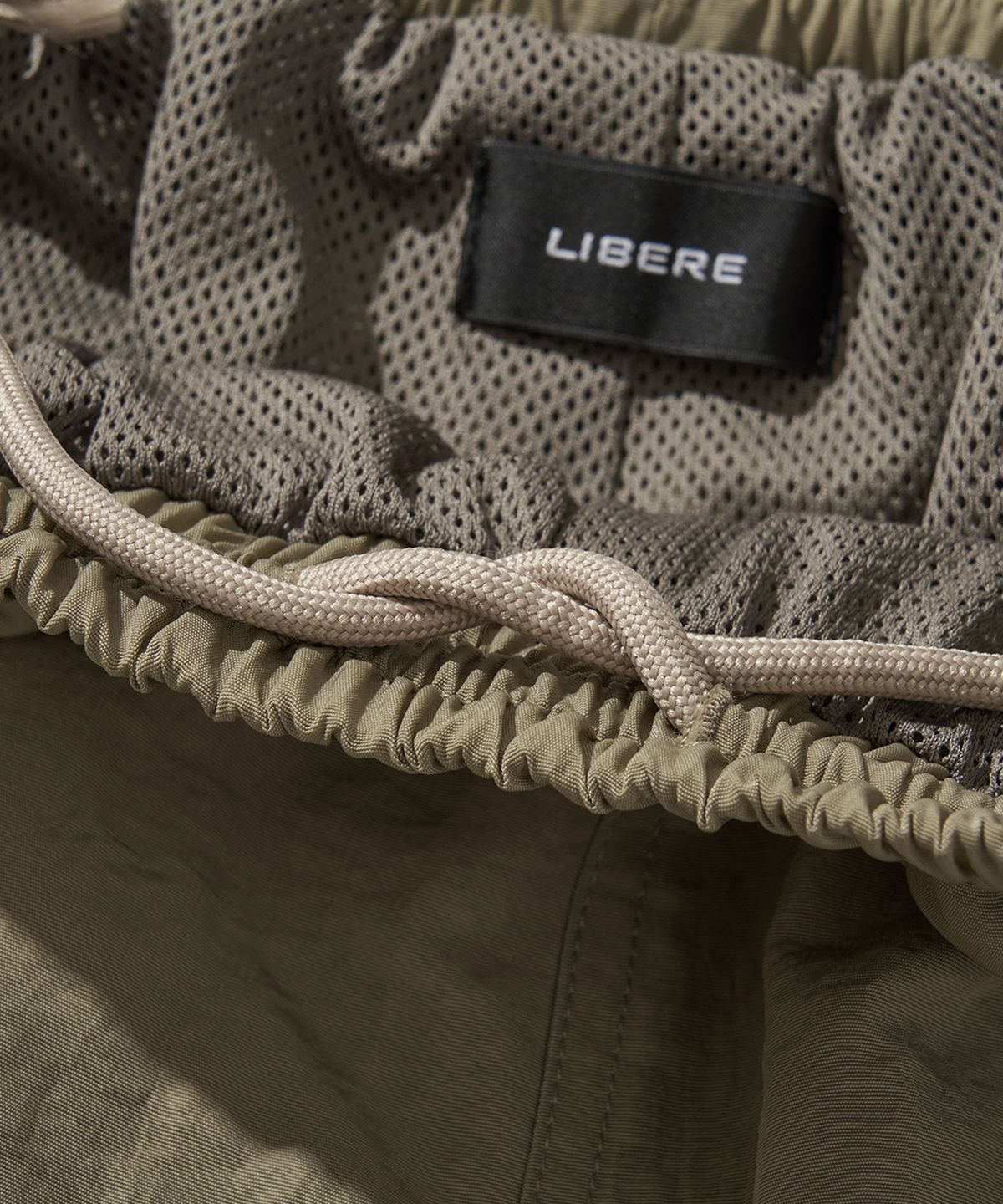 리베레(LIBERE) WESTERN FLAME TRACK PANTS / BEIGE
