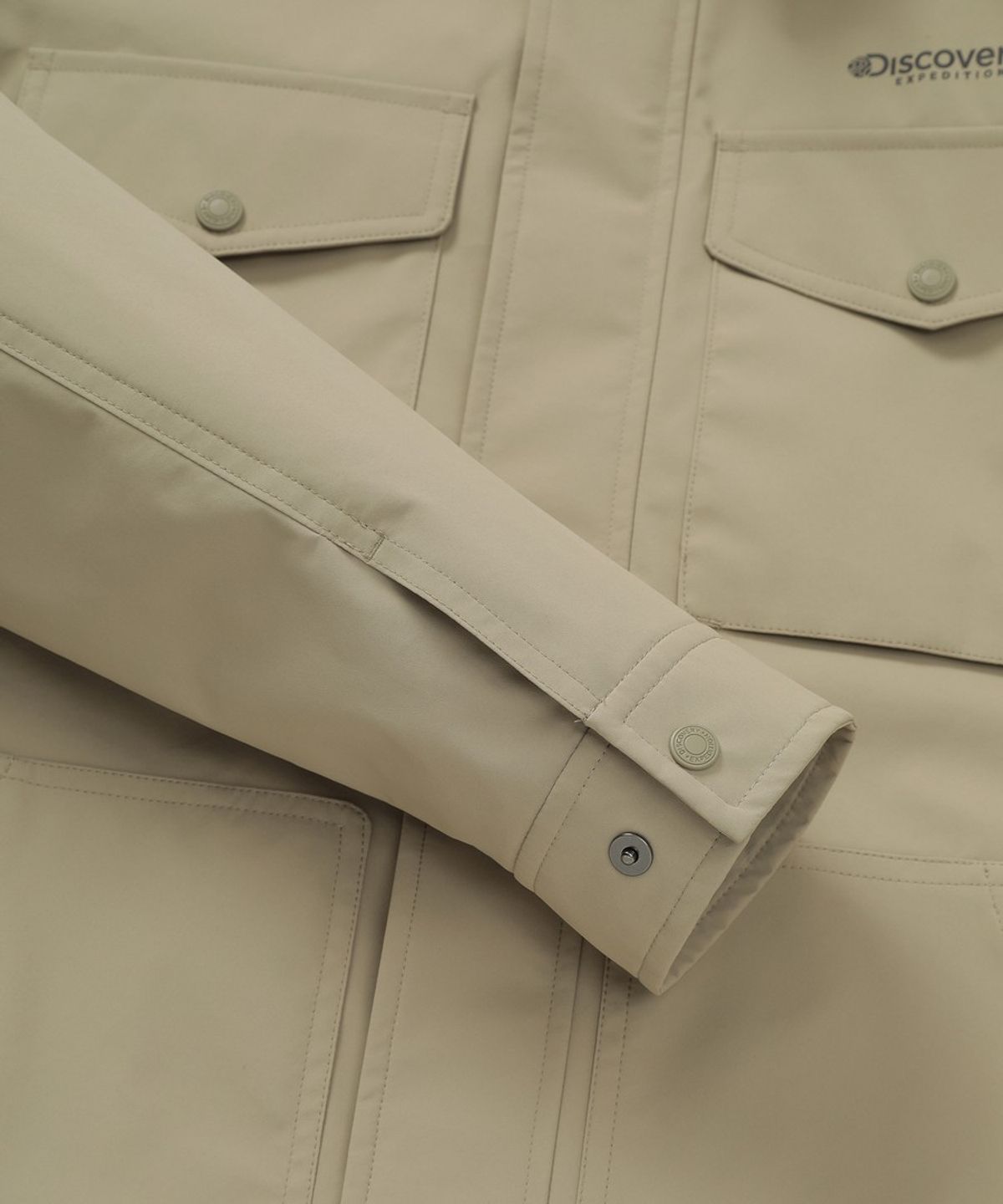디스커버리 익스페디션(DISCOVERY EXPEDITION) 남성 베르텍스 3L 카라형 워크자켓 (L/BEIGE)