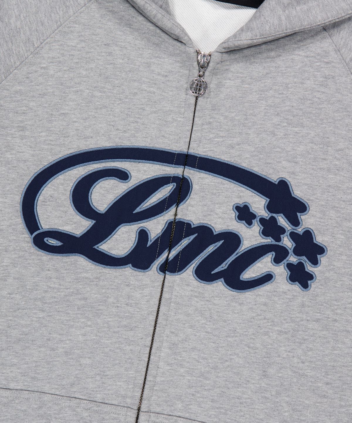 엘엠씨(LMC) STAR APPLIQUE LOGO ZIP-UP HOODIE heather gray