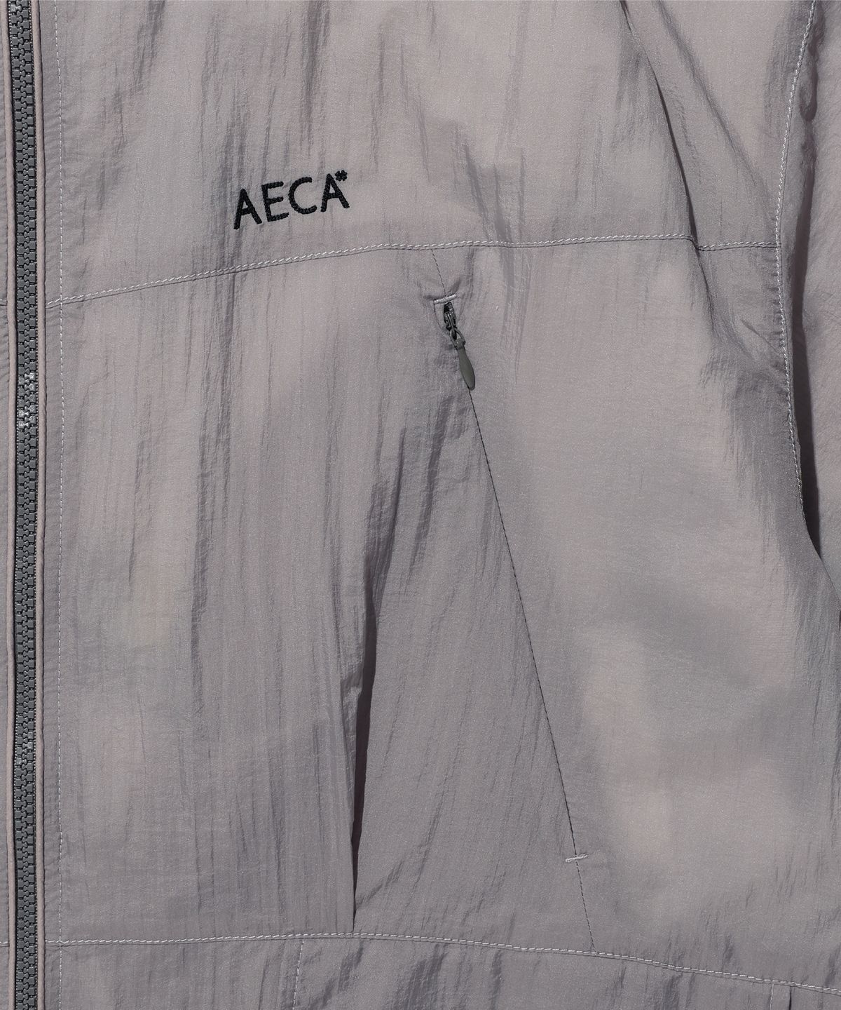 에이카화이트(AECA) REVERSIBLE PANEL WINDBREAKER-GREY