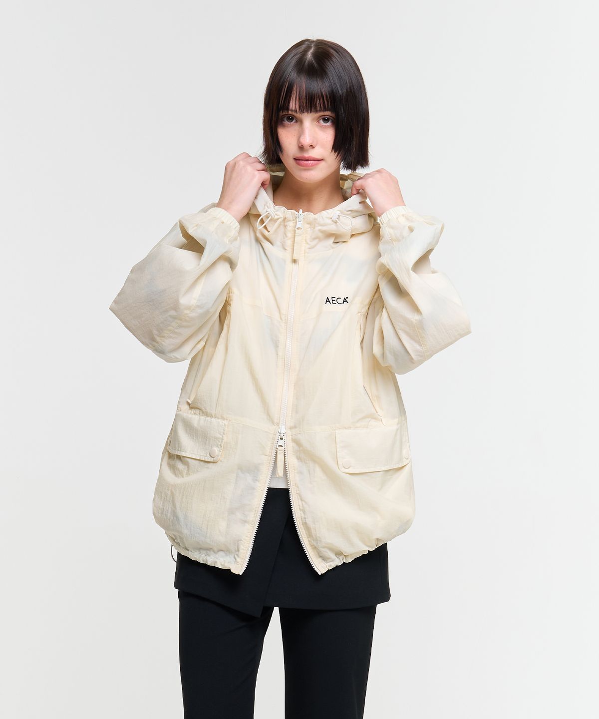 에이카화이트(AECA) REVERSIBLE PANEL WINDBREAKER-IVORY