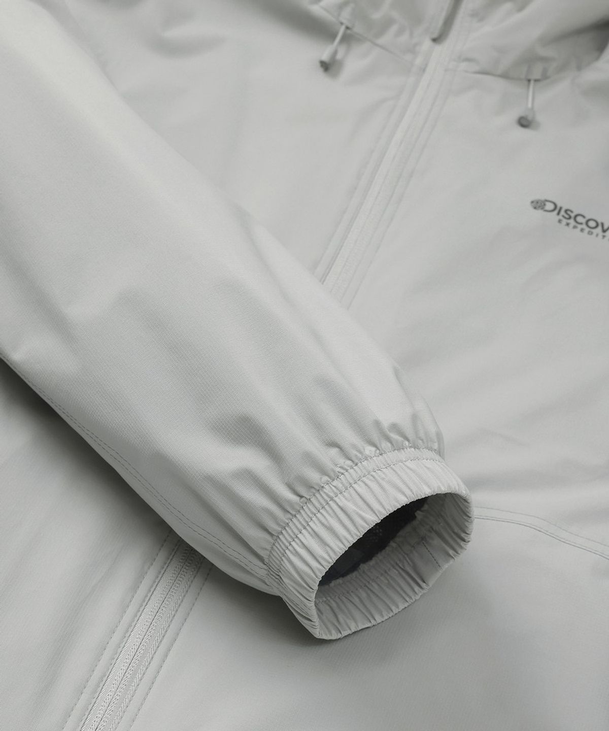 디스커버리 익스페디션(DISCOVERY EXPEDITION) 남성 기능성 2L 우븐 트레이닝 후드 자켓 (L/GREY)
