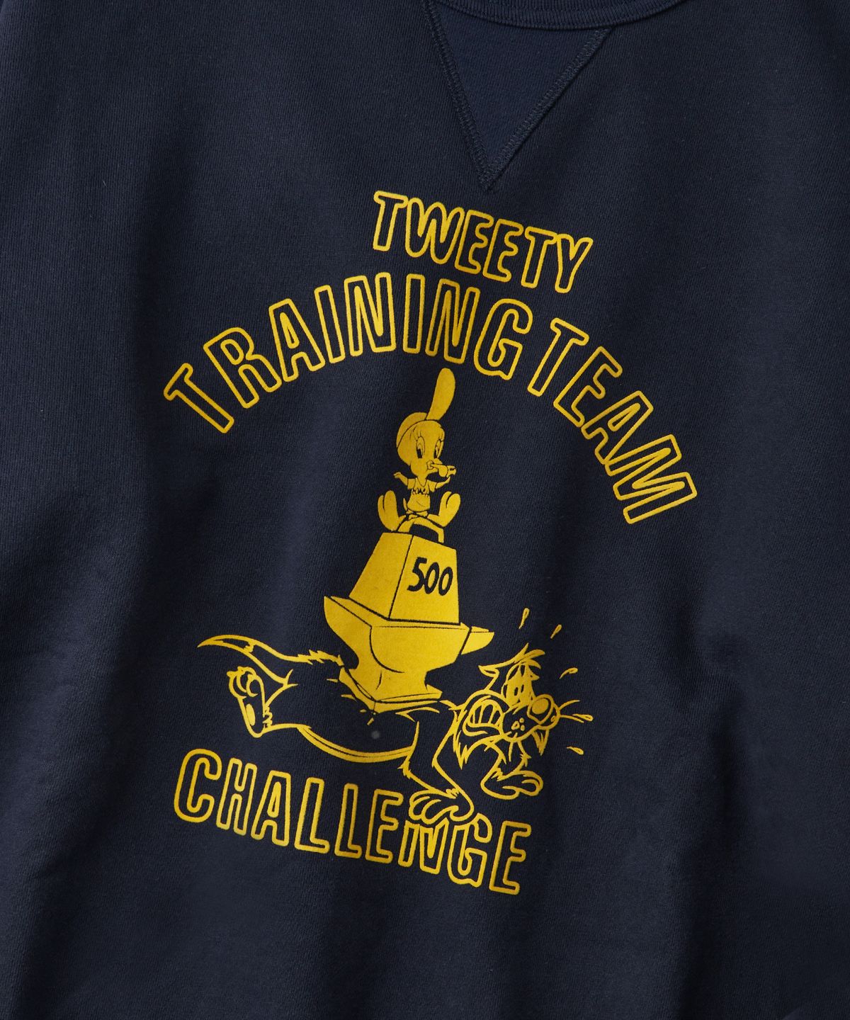 아웃스탠딩(OUTSTANDING) [LOONEY TUNES] SWEAT(TWEETY TRAINING TEAM)_NAVY