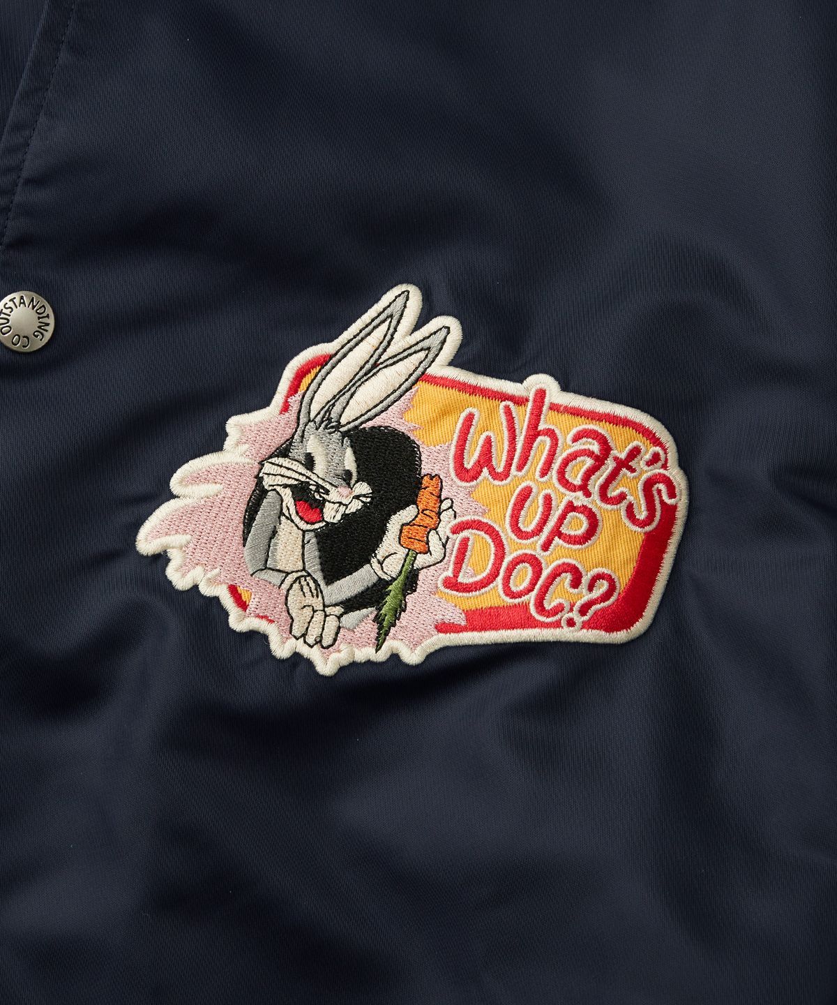 아웃스탠딩(OUTSTANDING) [LOONEY TUNES] WAPPEN COACH JACKET_NAVY