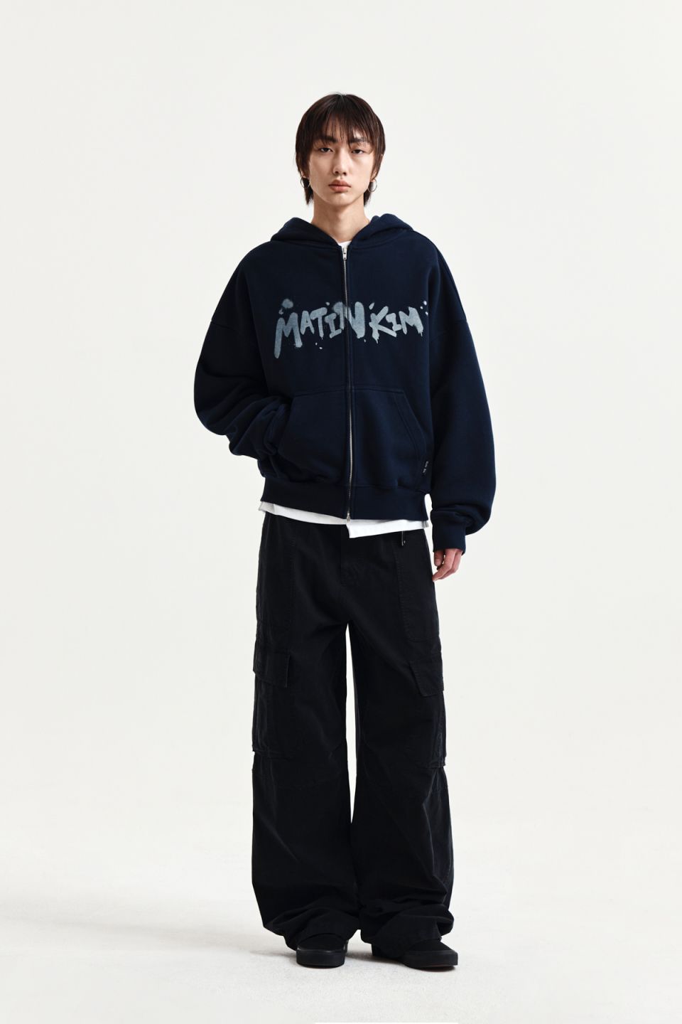 MUSINSA | MATIN KIM GRAFFITI LOGO HOODY ZIP UP IN NAVY