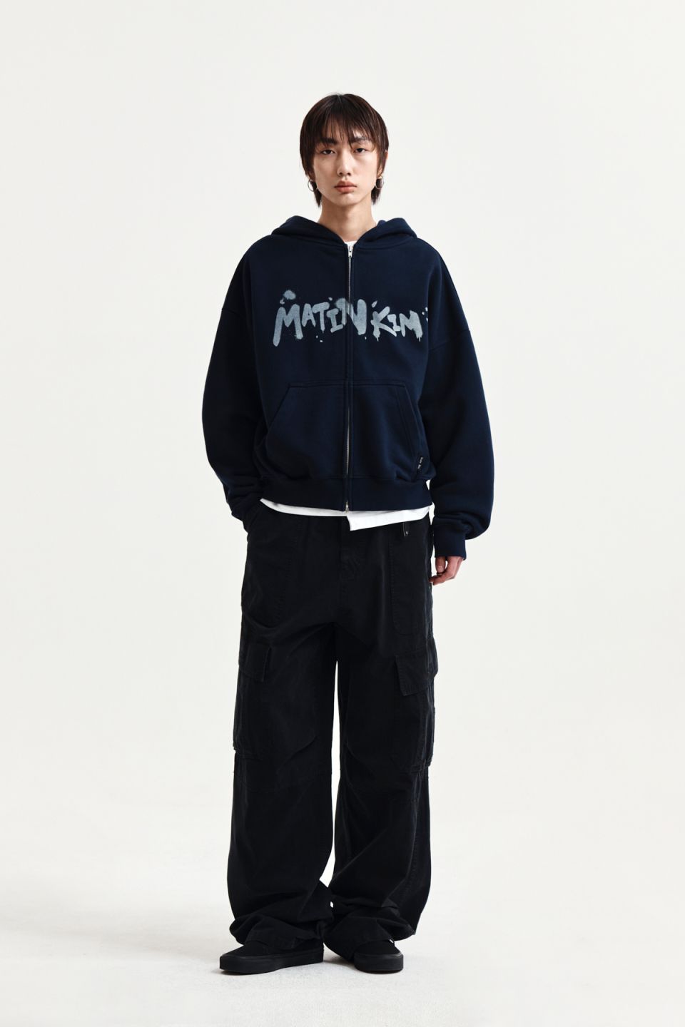 MUSINSA | MATIN KIM GRAFFITI LOGO HOODY ZIP UP IN NAVY