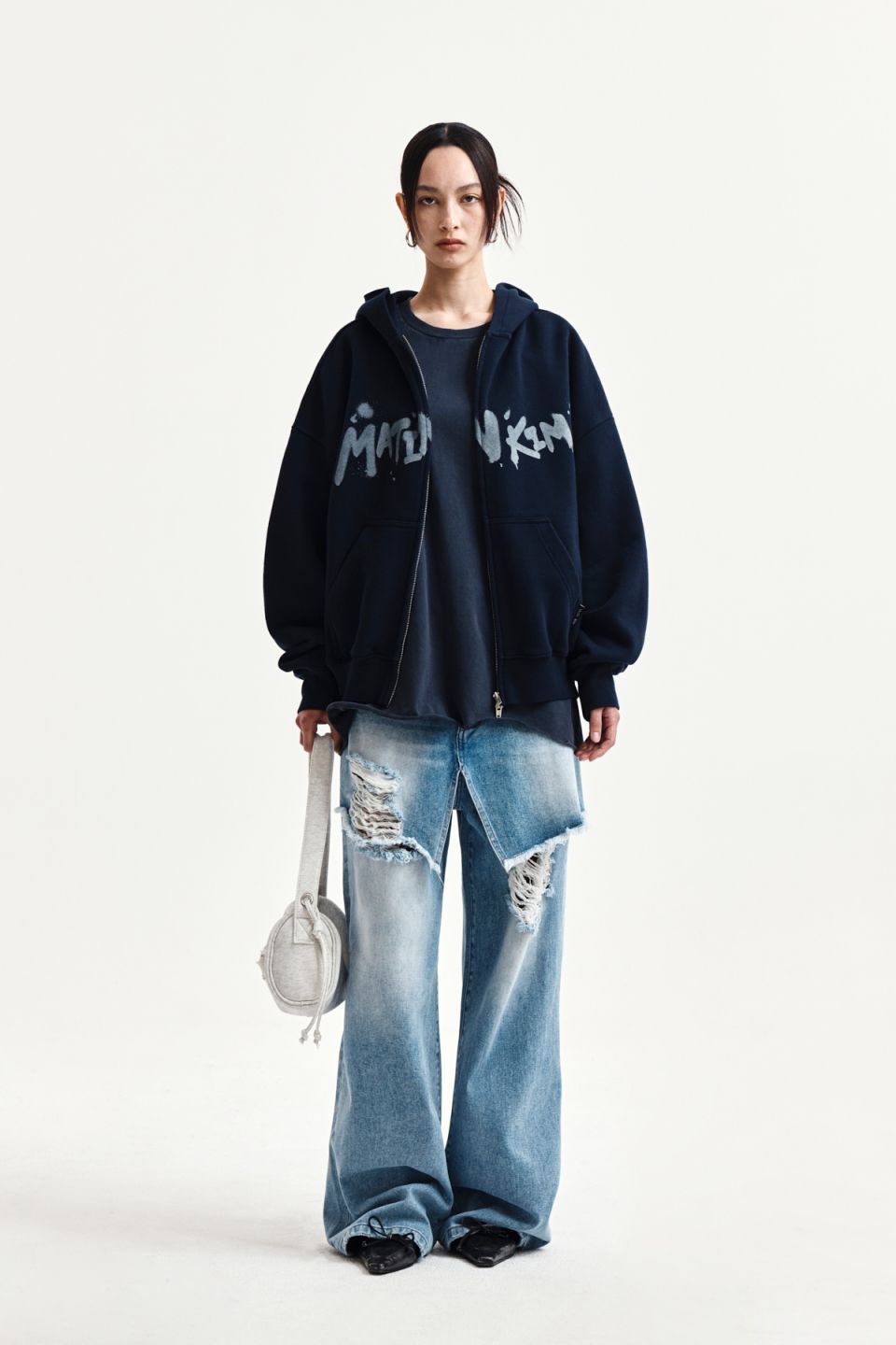 MUSINSA | MATIN KIM GRAFFITI LOGO HOODY ZIP UP IN NAVY
