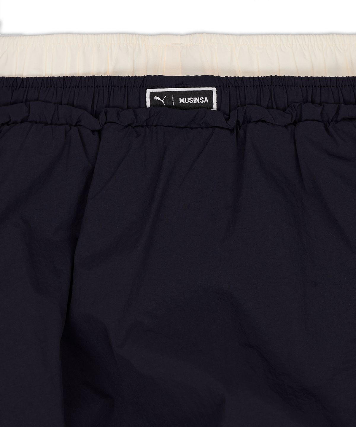 푸마(PUMA) 푸마 X 무신사 T7 벌룬 미니 스커트 - 네이비 / 638018-16