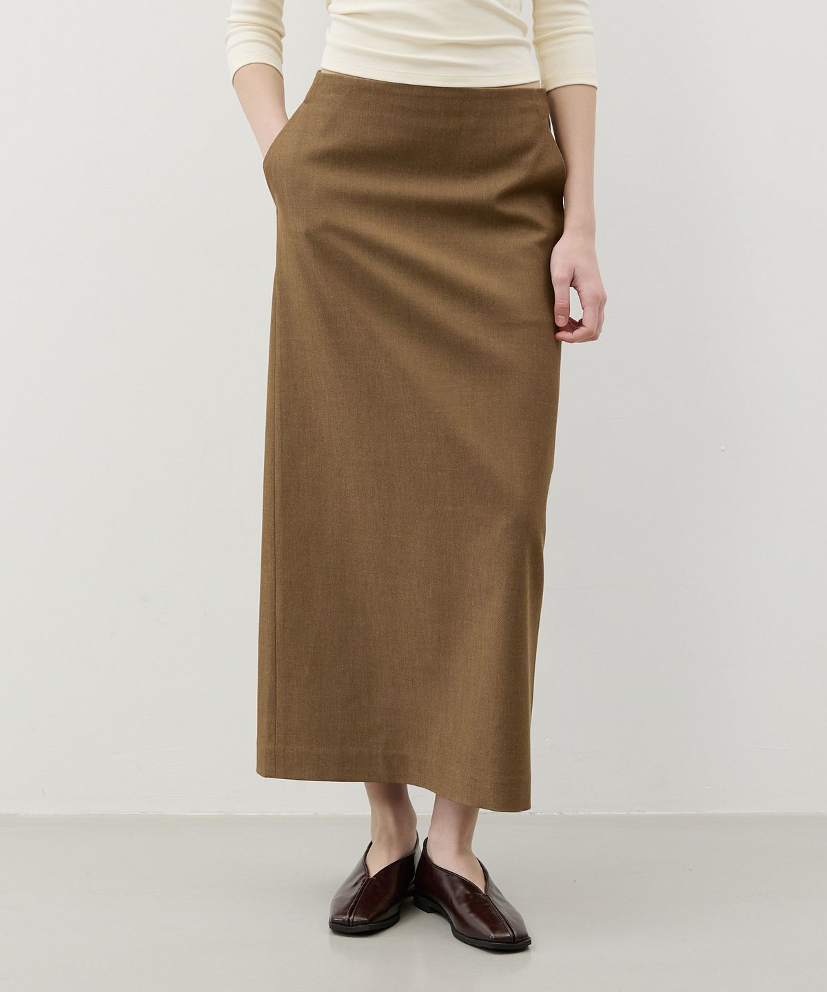 시티브리즈(CITYBREEZE) 캐시 벨라인 롱 스커트_BROWN