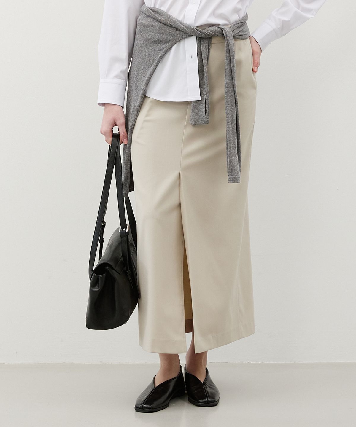 시티브리즈(CITYBREEZE) 스트랩 테일러드 롱 스커트_LIGHT BEIGE
