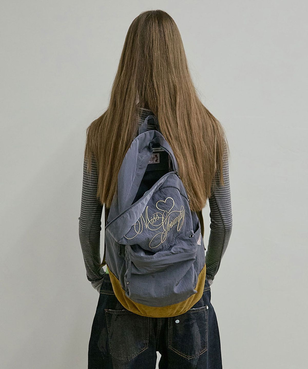 스컬프터(SCULPTOR) Grumpy Girl Nylon Backpack Metallic Navy