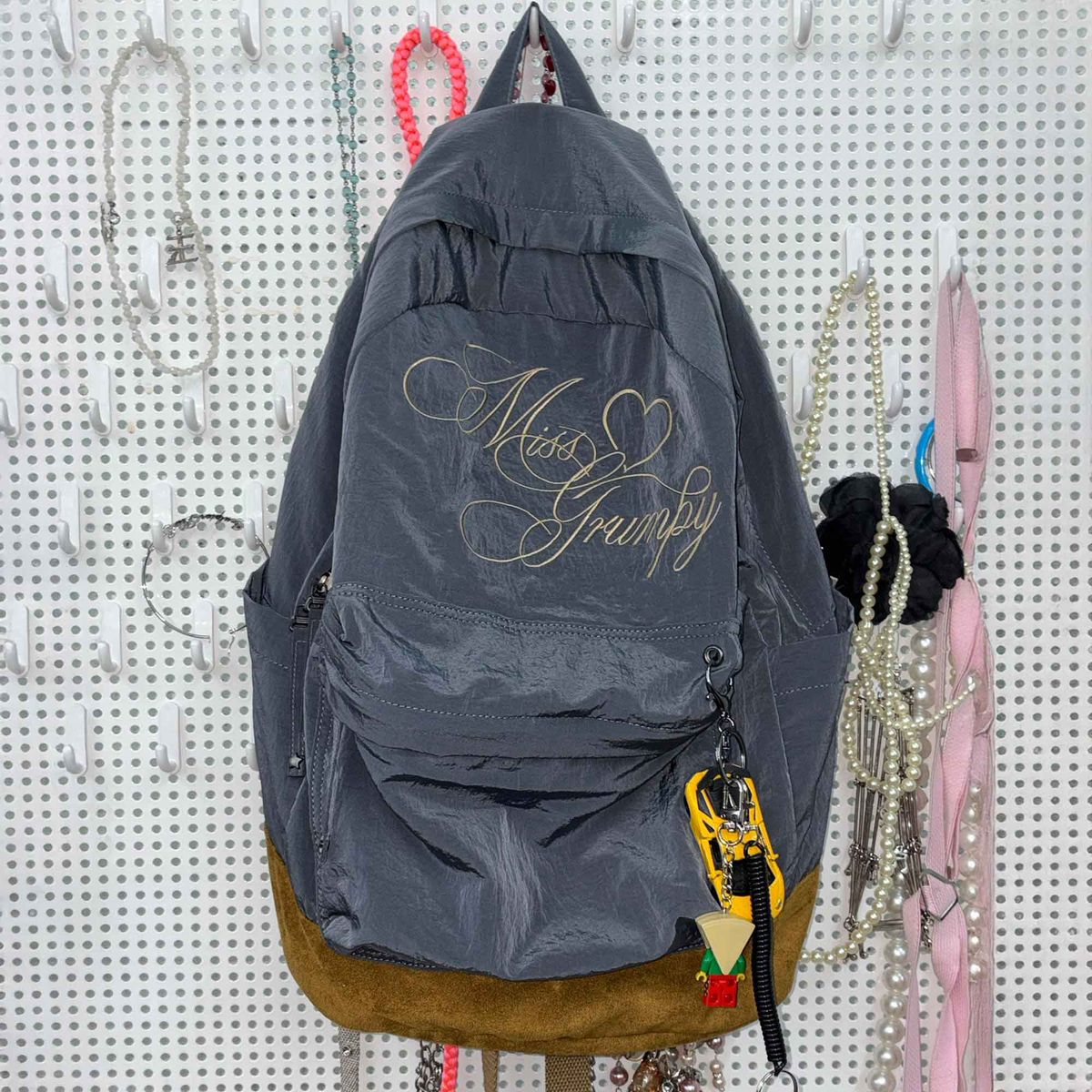 스컬프터(SCULPTOR) Grumpy Girl Nylon Backpack Metallic Navy