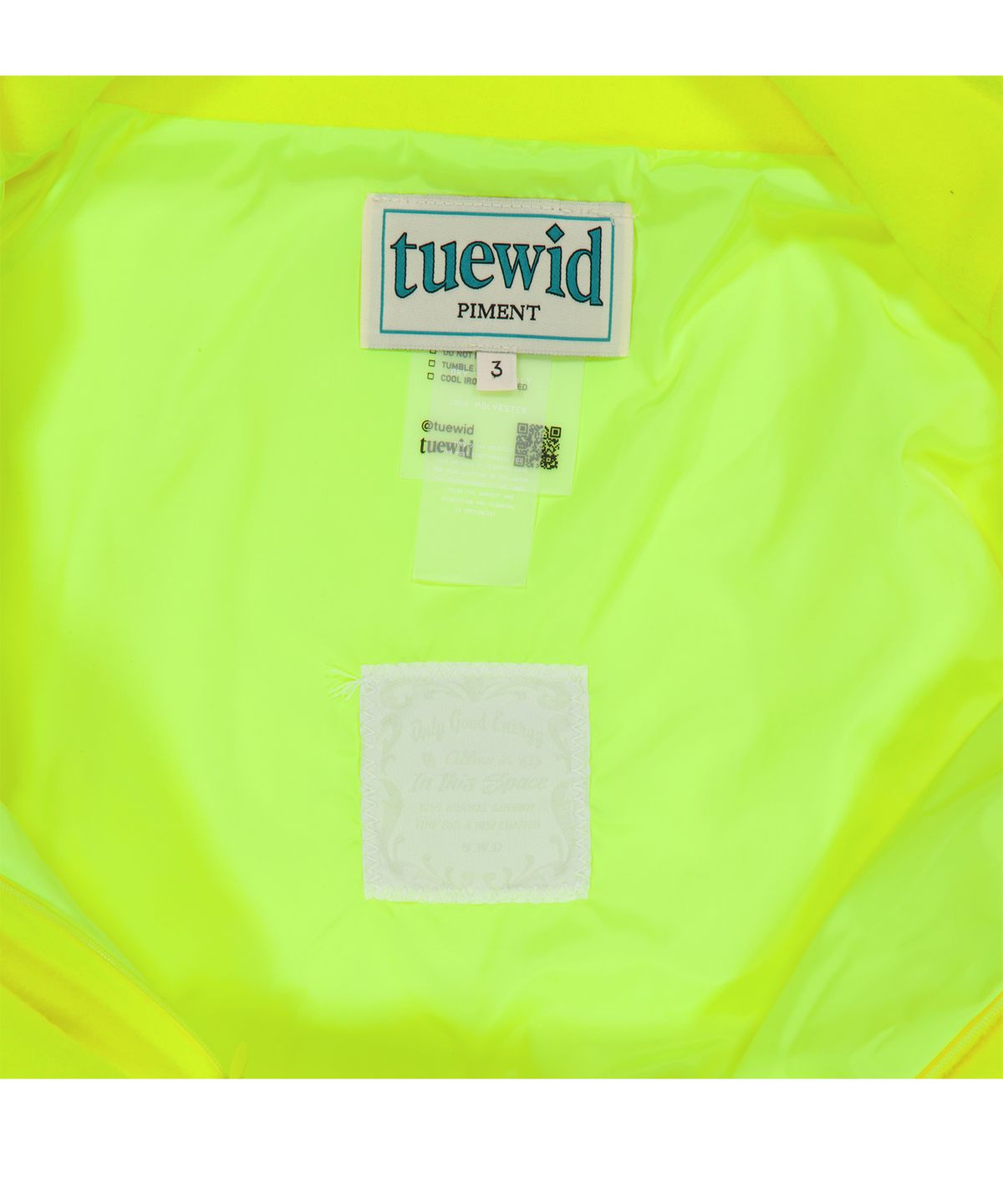 투위드(TUEWID) Diagonal half zipped snowboard fleece in neon green