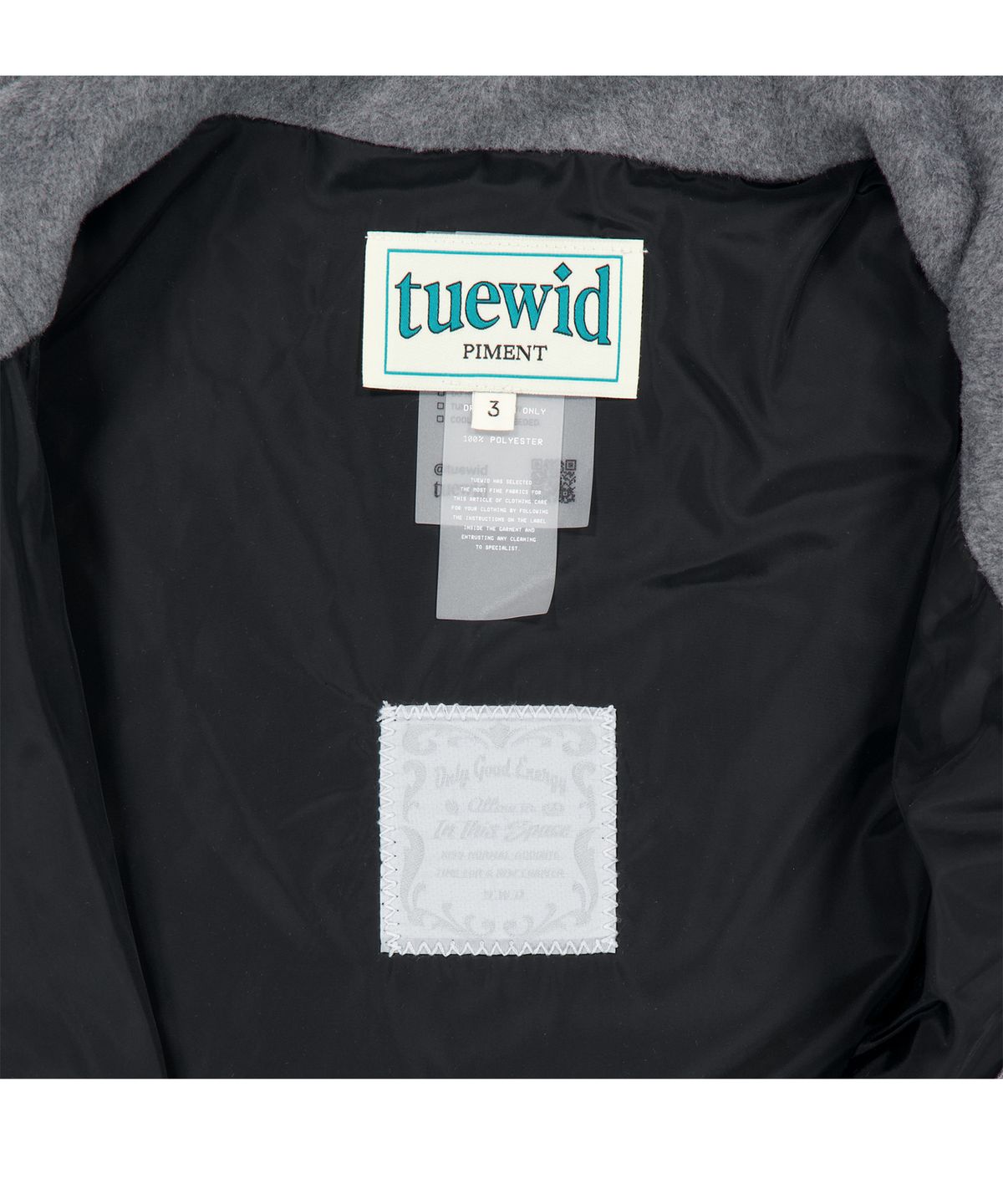 투위드(TUEWID) Diagonal half zipped snowboard fleece in melange gray
