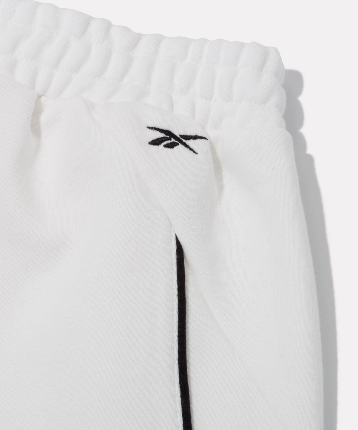 리복(REEBOK) 나노 와이드핏 스웨트 팬츠 (W) - 화이트