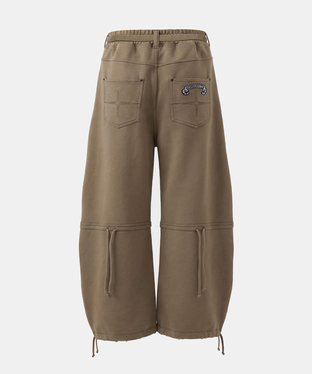 MUSINSA | BADBLOOD Destroyed Raw-Edge Joggers - Dark Tan