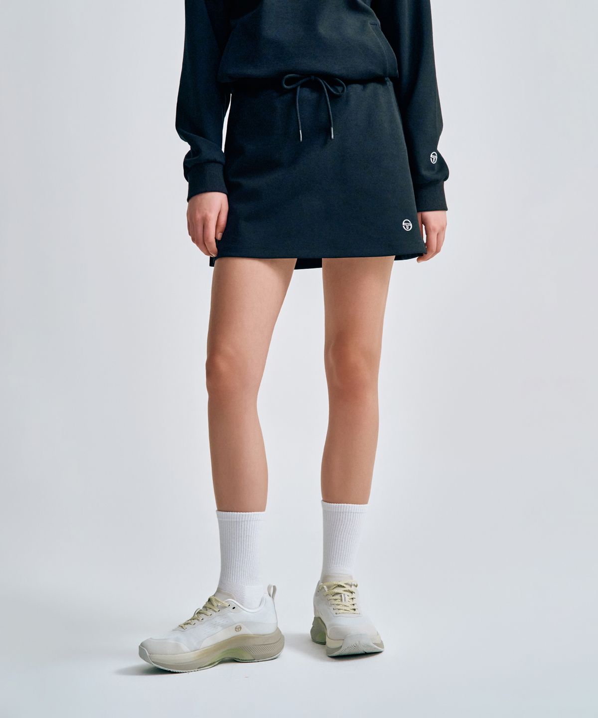 세르지오 타키니(SERGIO TACCHINI) W 쿠쉬라이트 스커트 (Black)