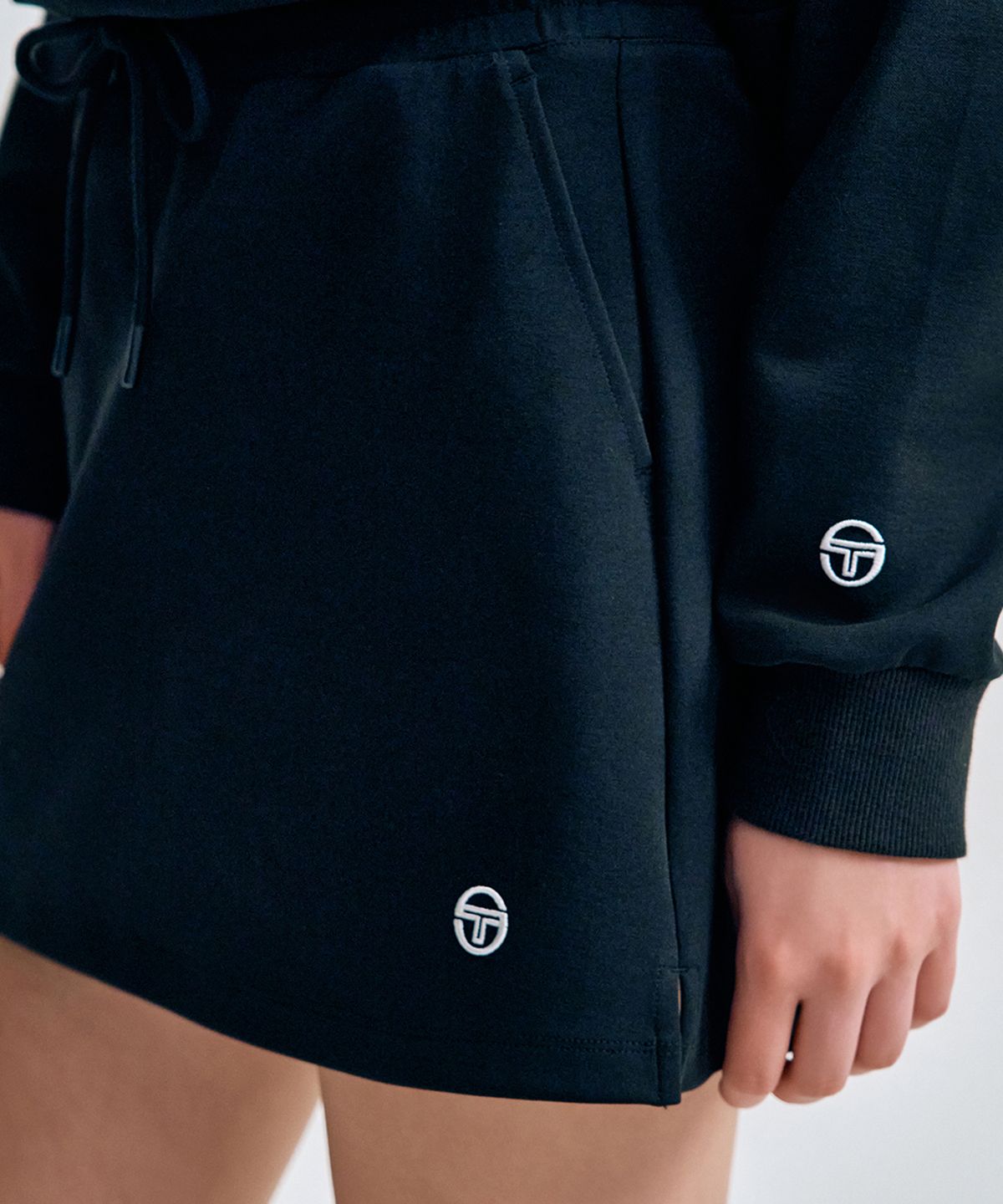 세르지오 타키니(SERGIO TACCHINI) W 쿠쉬라이트 스커트 (Black)
