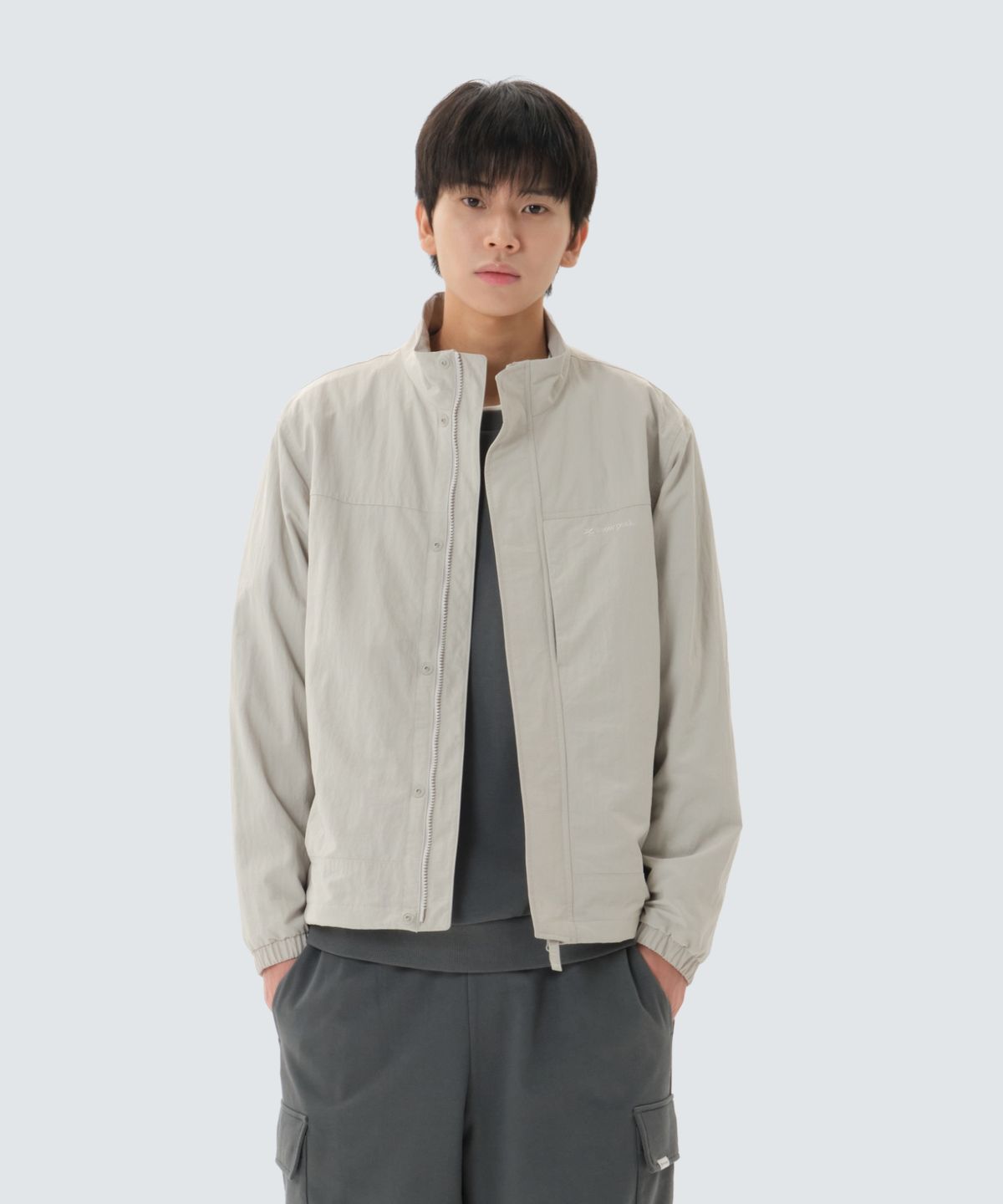 스노우피크 어패럴(SNOWPEAK APPAREL) 캠플 스탠드넥 바람막이 (S26ZMCWB12) Light Beige