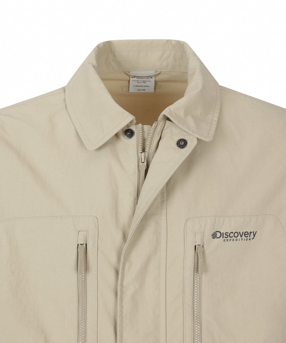 디스커버리 익스페디션(DISCOVERY EXPEDITION) 남성 프레시벤트 카라형 아웃포켓 바람막이 (BEIGE2)