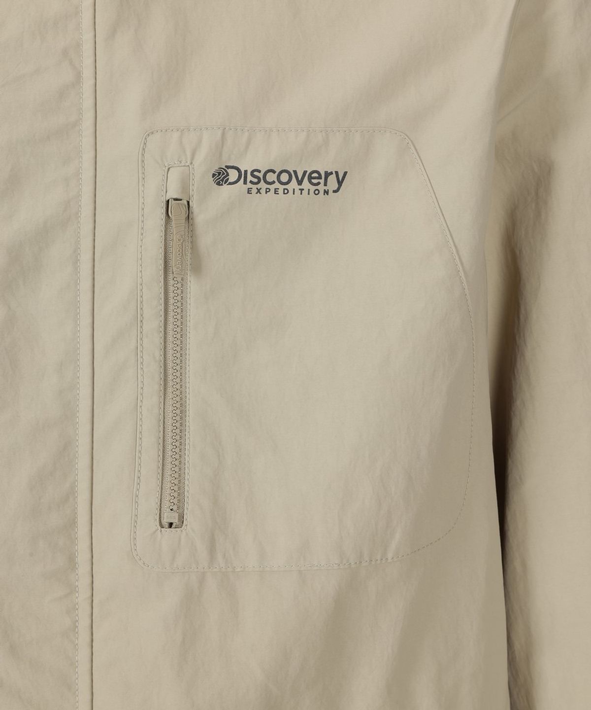 디스커버리 익스페디션(DISCOVERY EXPEDITION) 남성 프레시벤트 카라형 아웃포켓 바람막이 (BEIGE2)