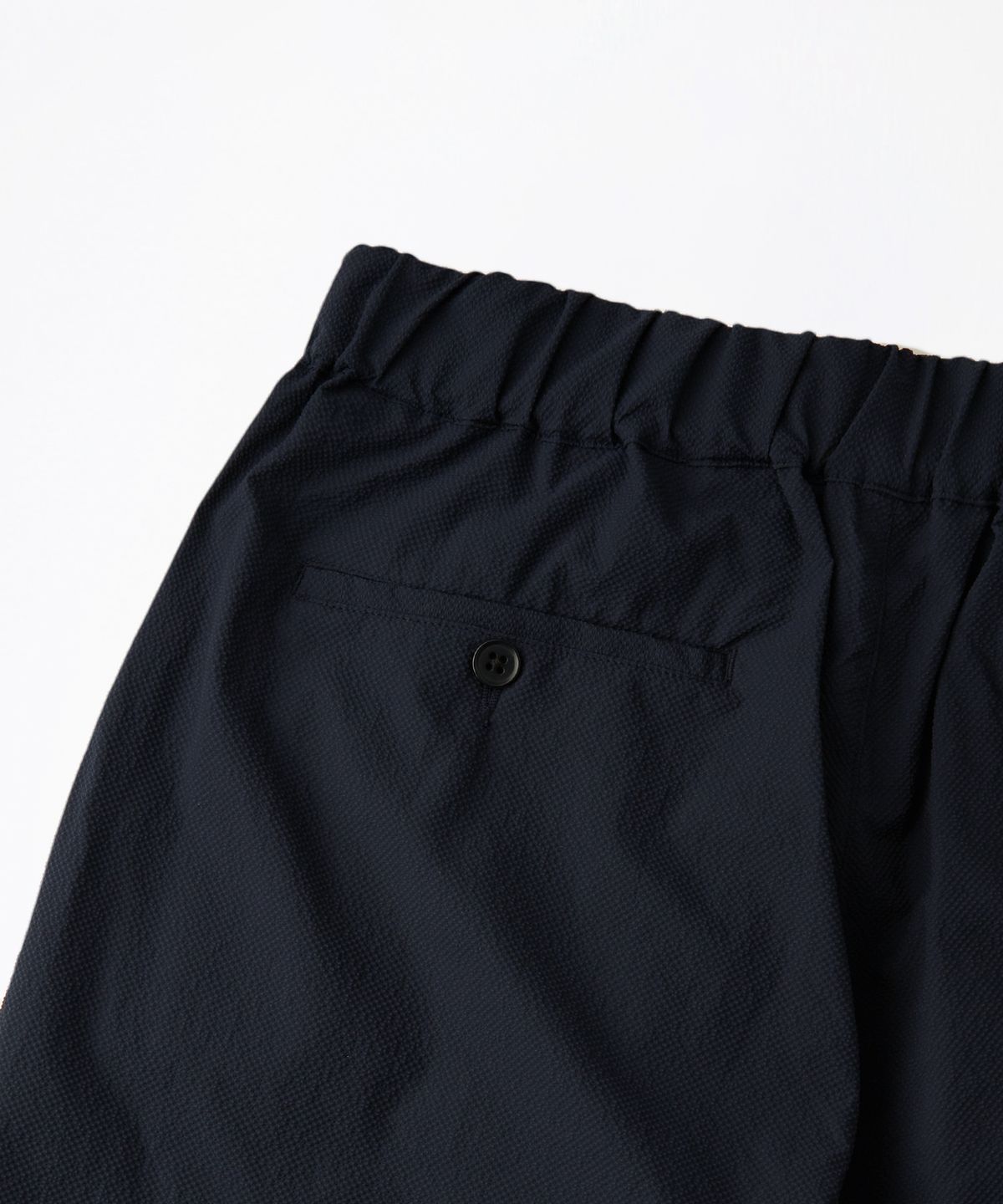 아웃스탠딩(OUTSTANDING) SEERSUCKER COMFORT PANTS_NAVY