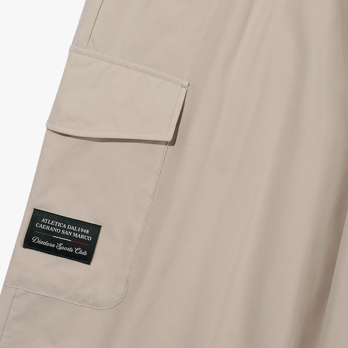 디아도라(diadora) 쿨웨이브 조거 팬츠 BEIGE