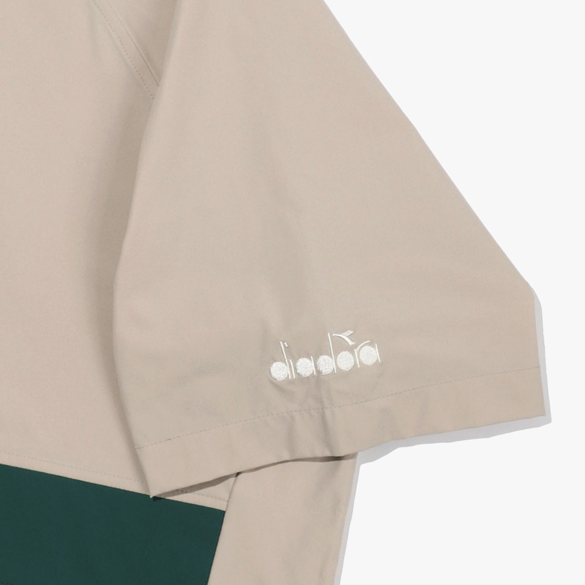 디아도라(diadora) 쿨웨이브 반팔 아노락 BEIGE