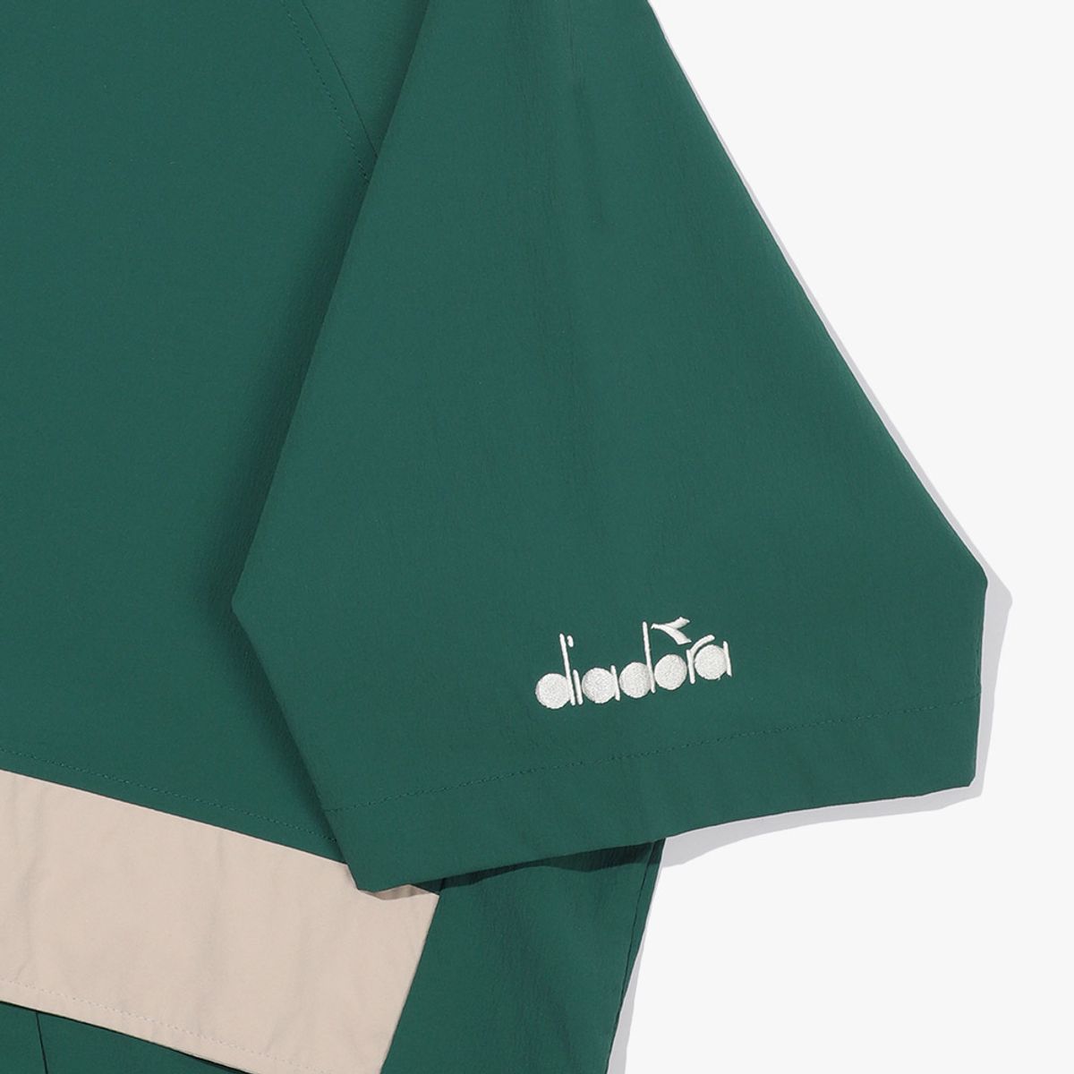디아도라(diadora) 쿨웨이브 반팔 아노락 GREEN