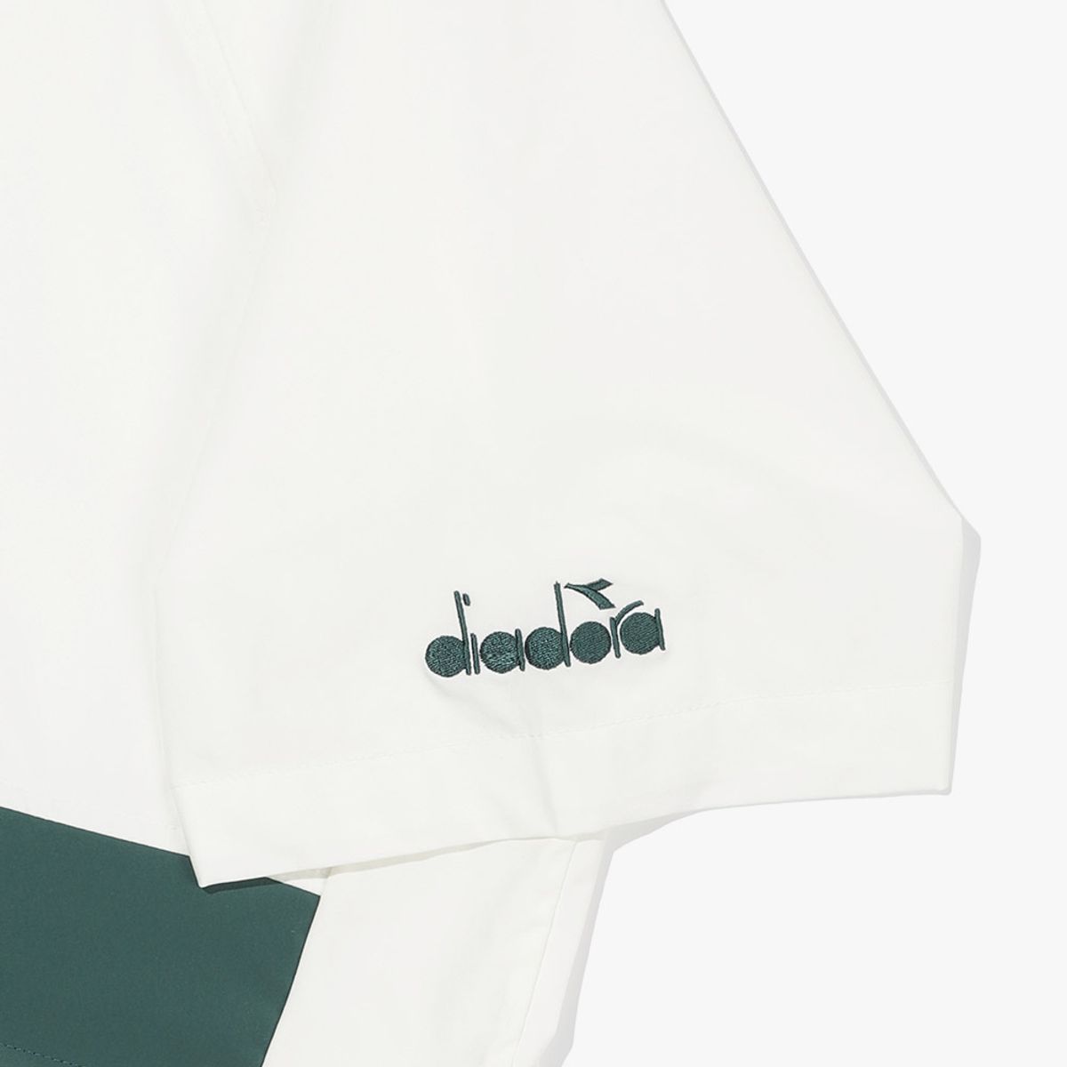 디아도라(diadora) 쿨웨이브 반팔 아노락 IVORY