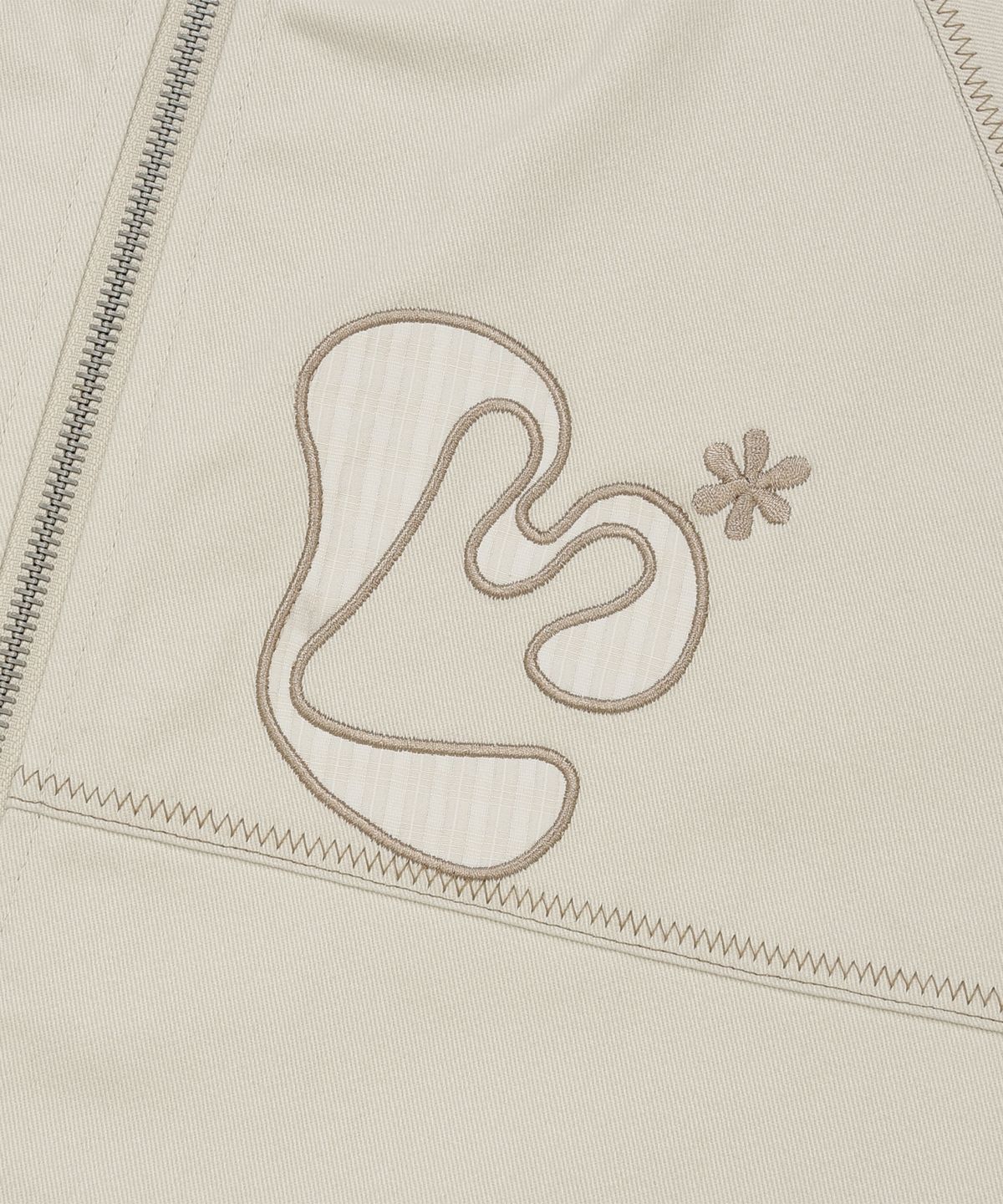 엘엠알(LMR) 아플리케 플로럴 로고 체크 배색 후드 자켓 LIGHT BEIGE