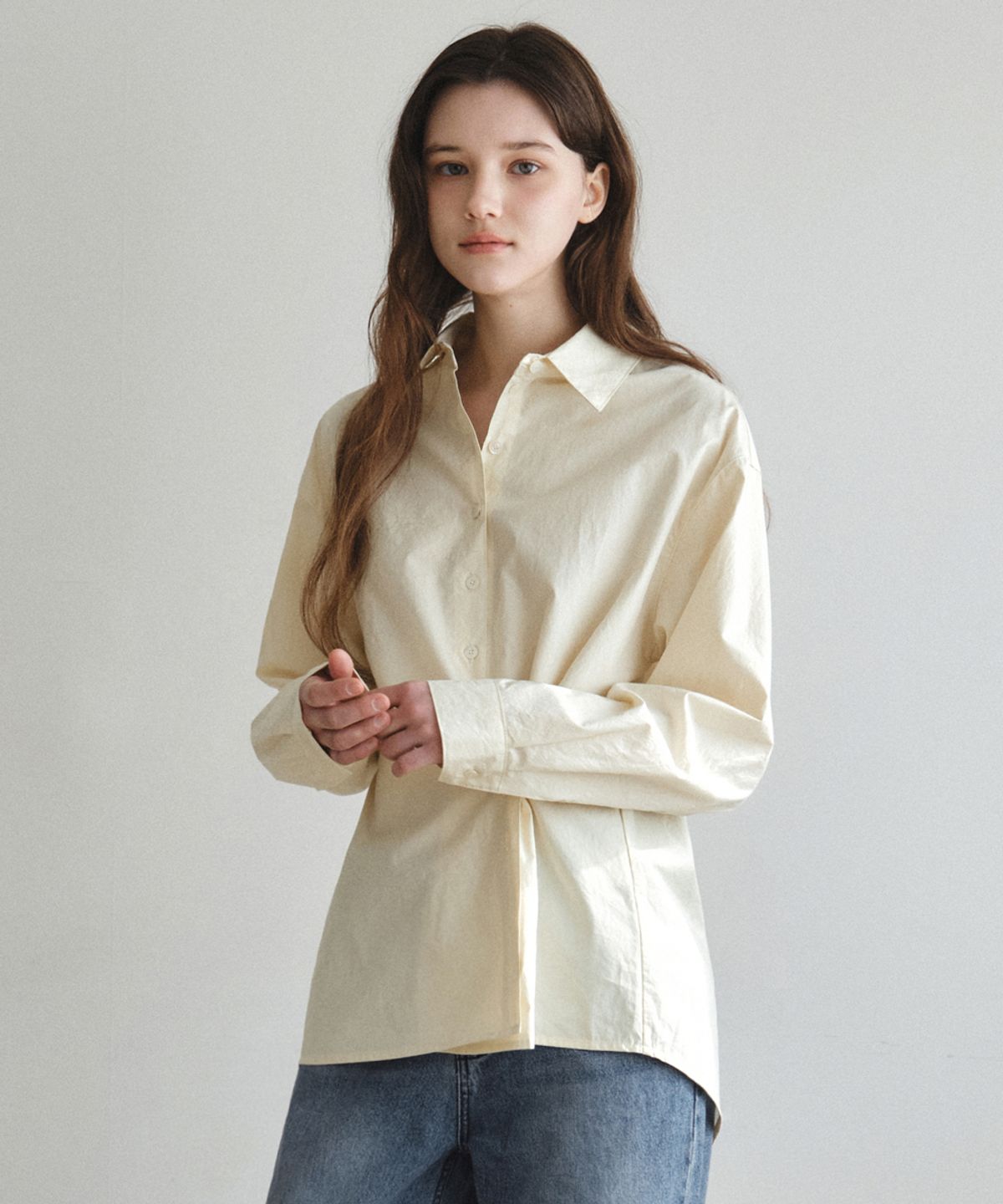 웬즈데이오아시스 포 우먼(WEDNESDAYOASISFORWOMEN) 사이드 버튼 랩 셔츠_LIGHT YELLOW(W26SH03)