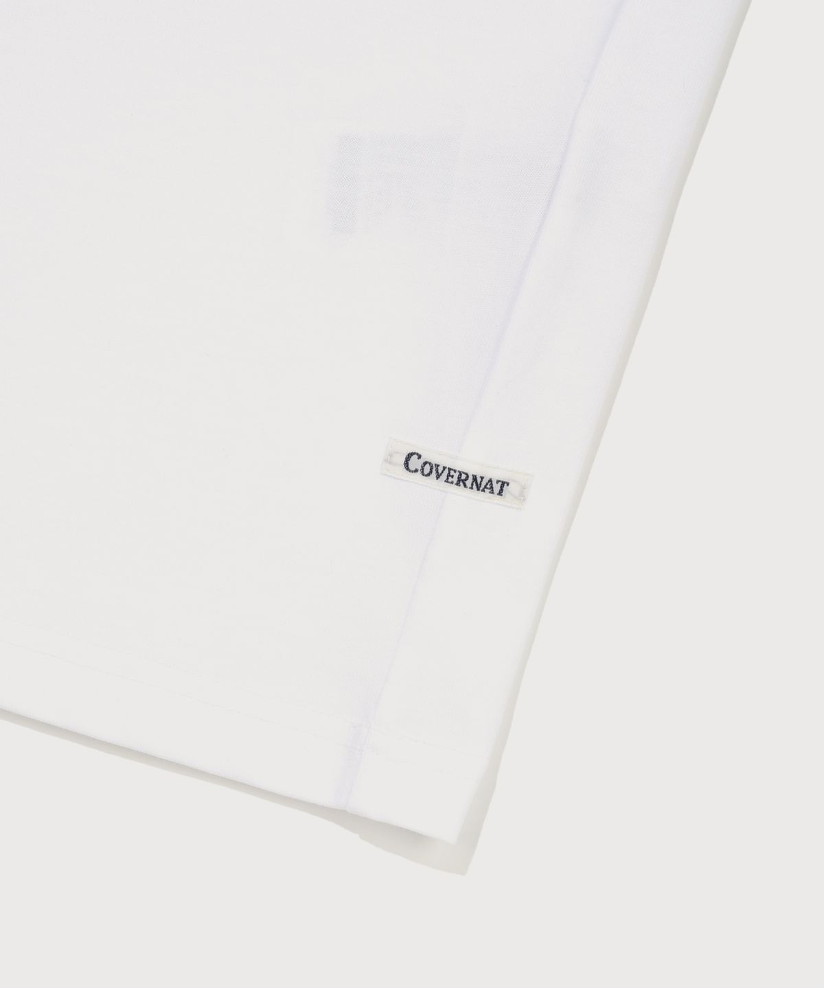 커버낫(COVERNAT) 센터 로고 티셔츠 화이트