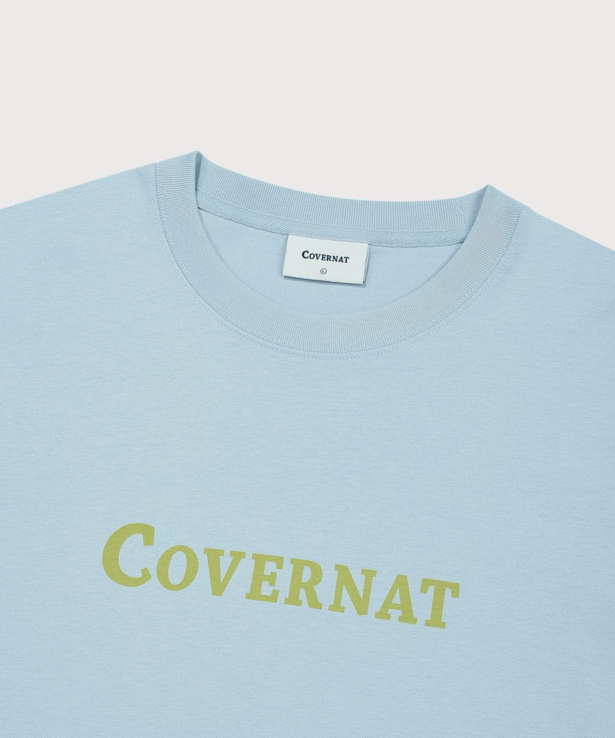커버낫(COVERNAT) 센터 로고 티셔츠 라이트 블루