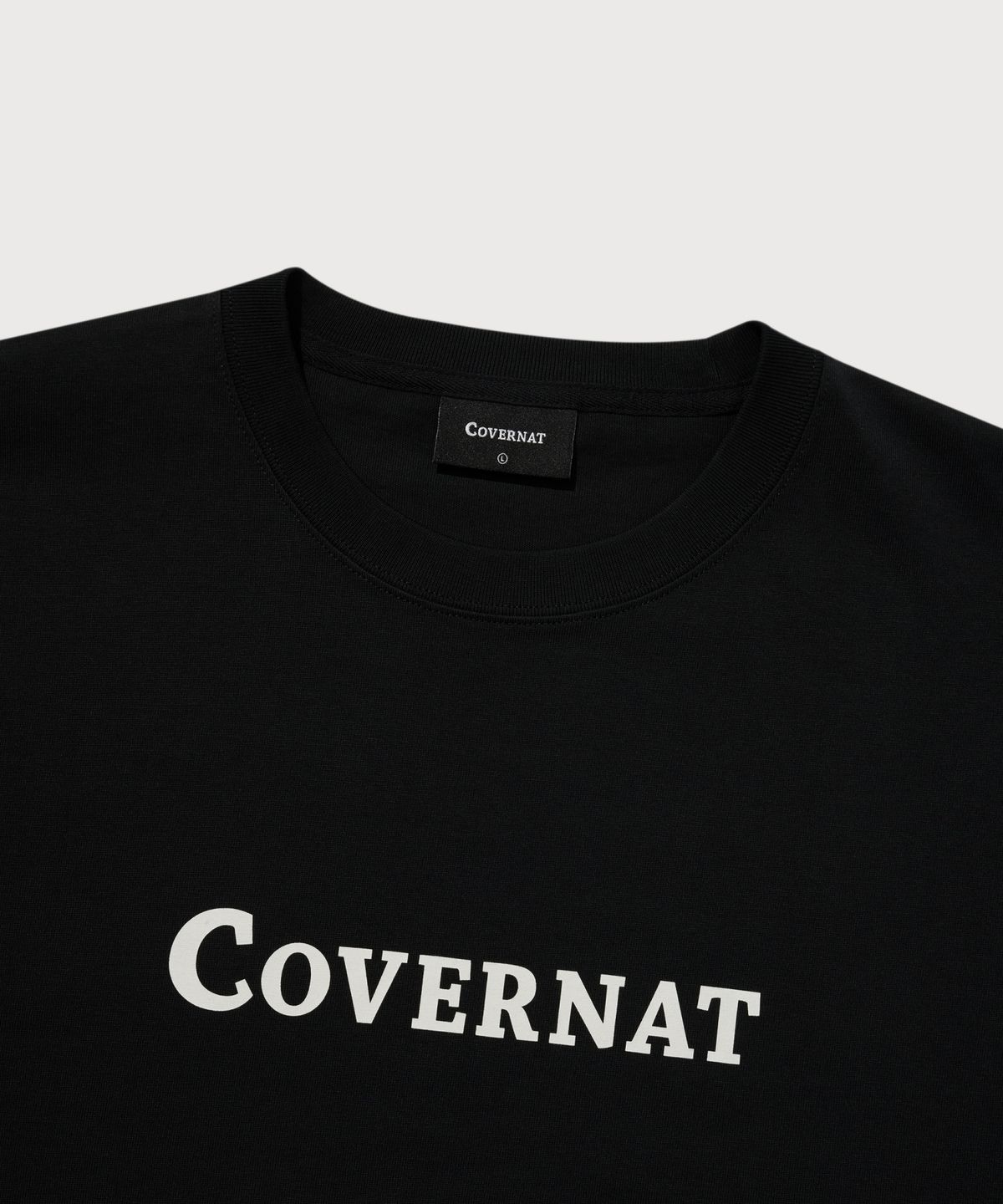 커버낫(COVERNAT) 센터 로고 티셔츠 블랙