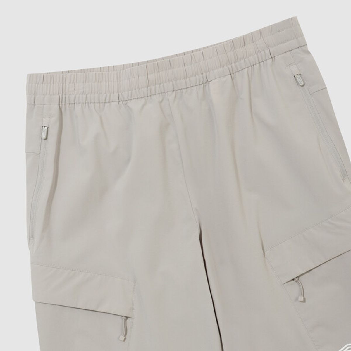 엄브로(UMBRO) 올라운드 스트레치 카고 조거 팬츠 베이지 UR123SPT21