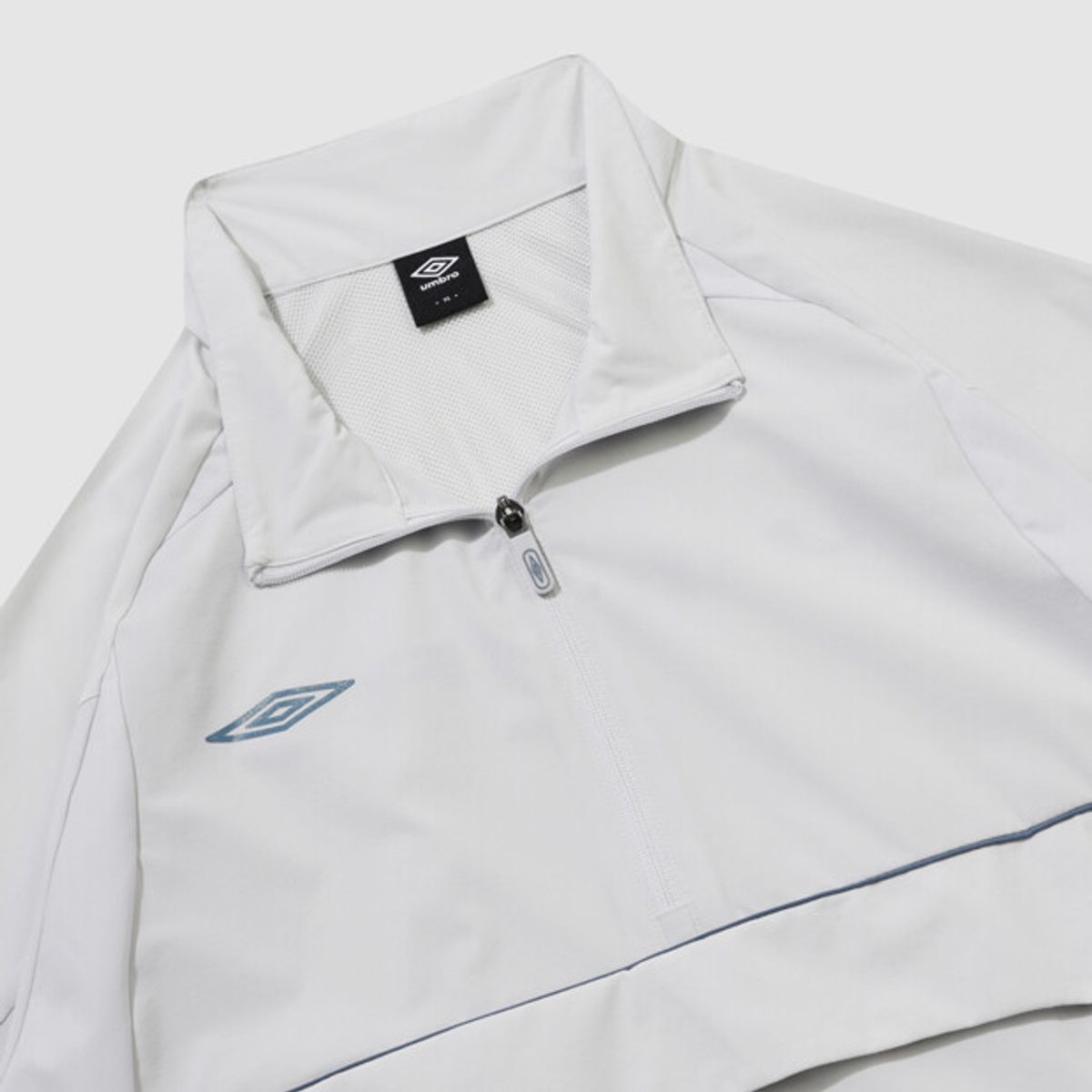 엄브로(UMBRO) 올라운드 스트레치 스탠넥 아노락 라이트 그레이 UR121SWT21
