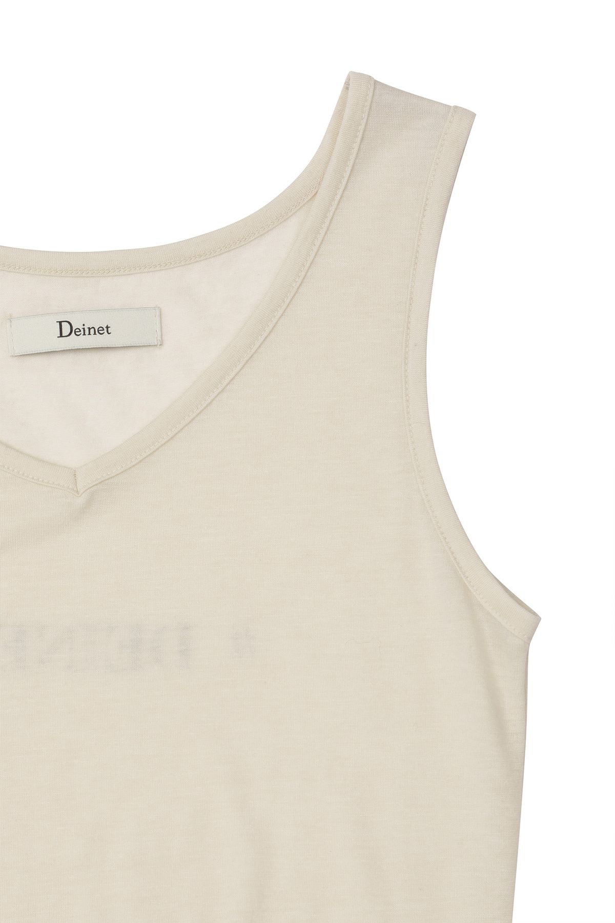 다이닛(DEINET) IST KULTUR SLEEVELESS IN BEIGE