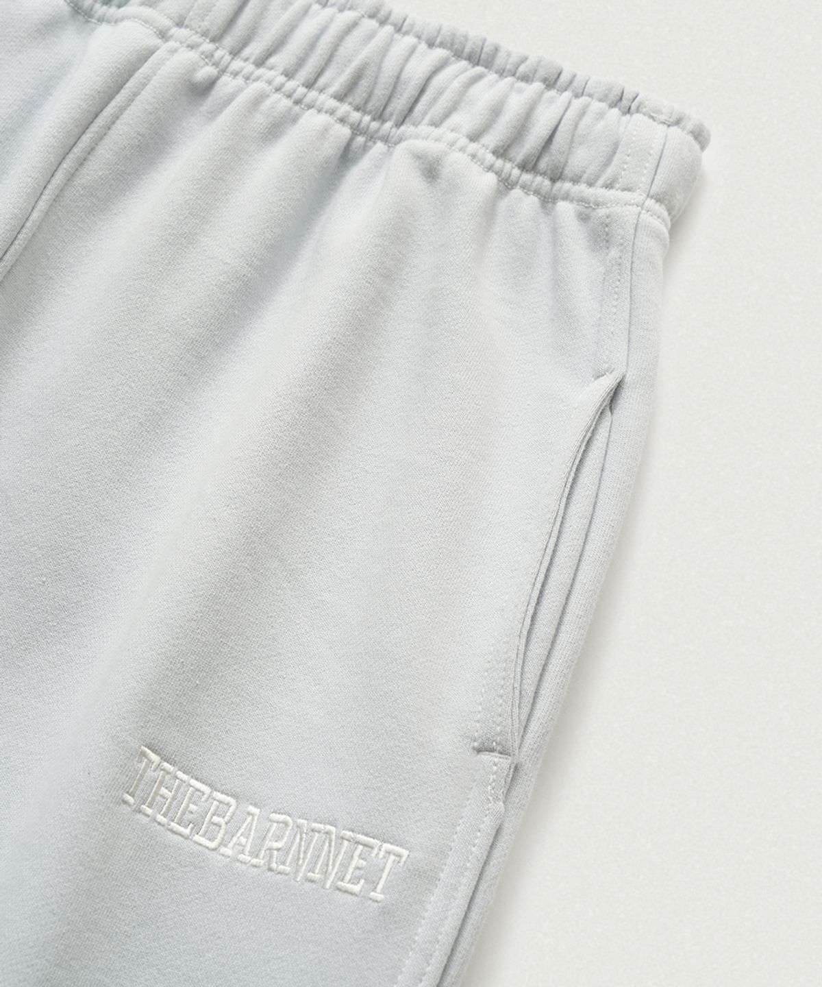 더바넷(THEBARNNET) Campie Sweat Drawstring Jogger Pants_Pale Blue