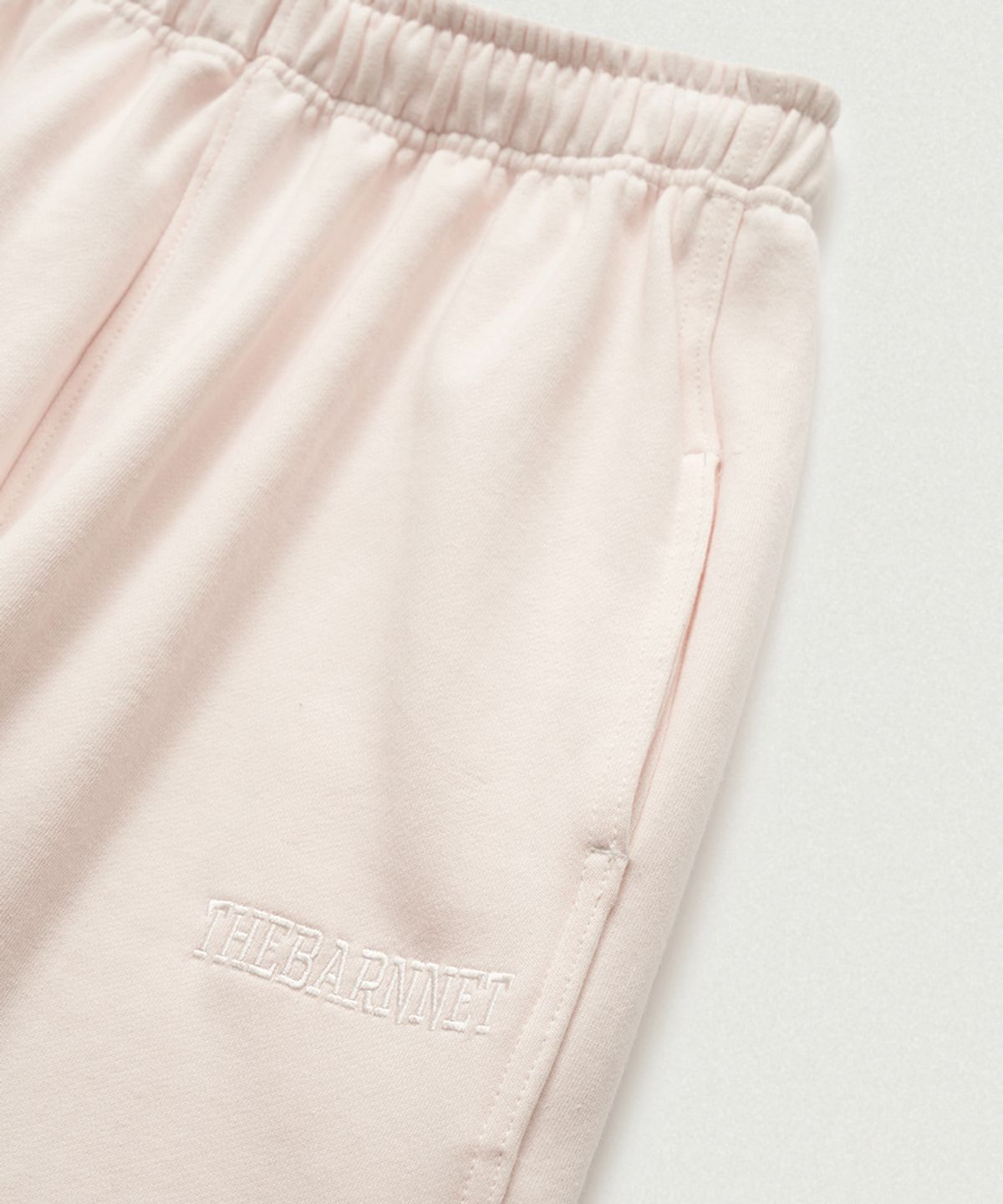 더바넷(THEBARNNET) Campie Sweat Drawstring Jogger Pants_Light Pink