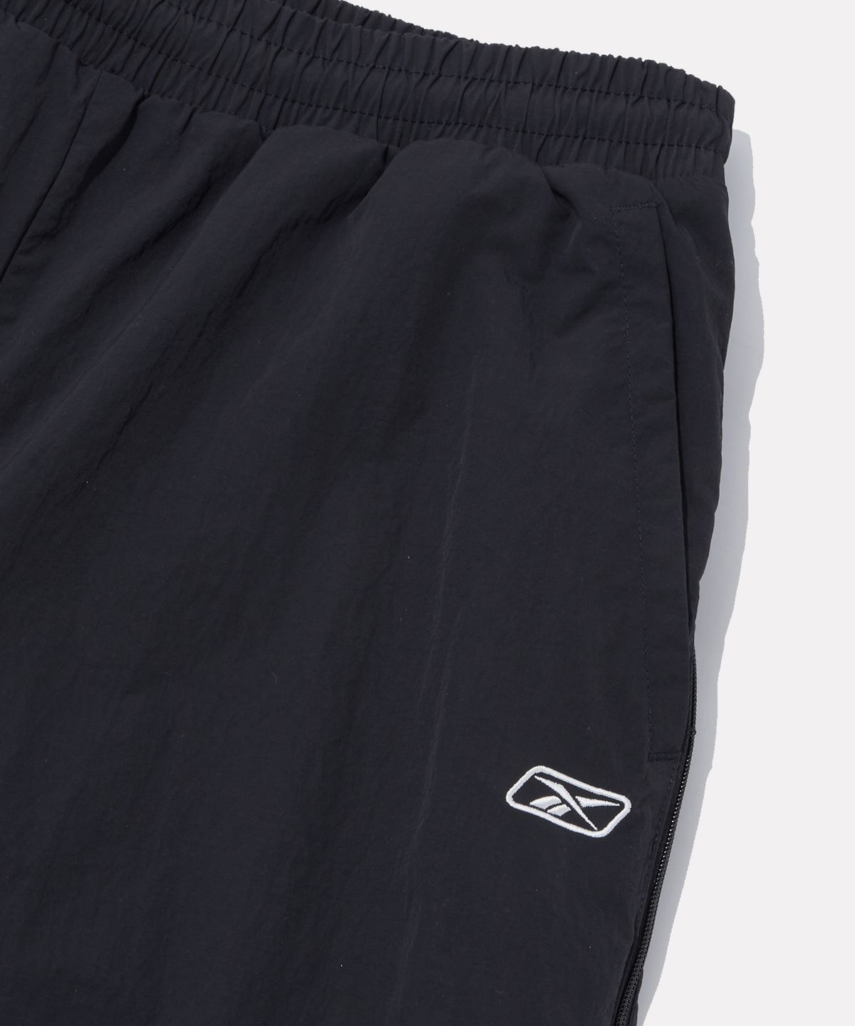 리복(REEBOK) 프리미어 우븐 트랙 팬츠 (W) - 딥 차콜