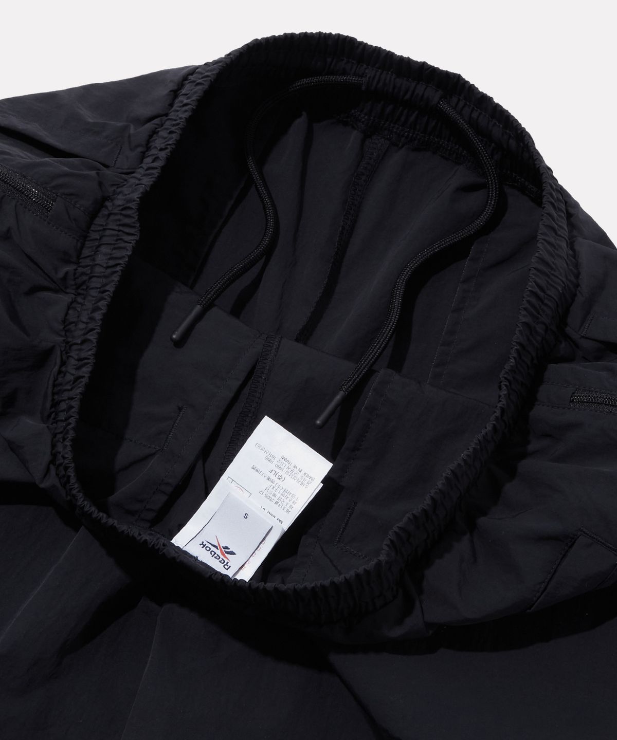 리복(REEBOK) 프리미어 우븐 트랙 팬츠 (W) - 딥 차콜