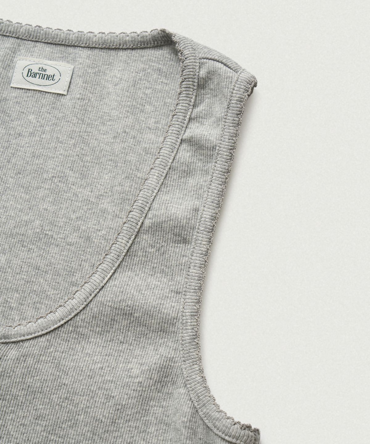더바넷(THEBARNNET) Clara Button Layer Tank Top_Light Grey